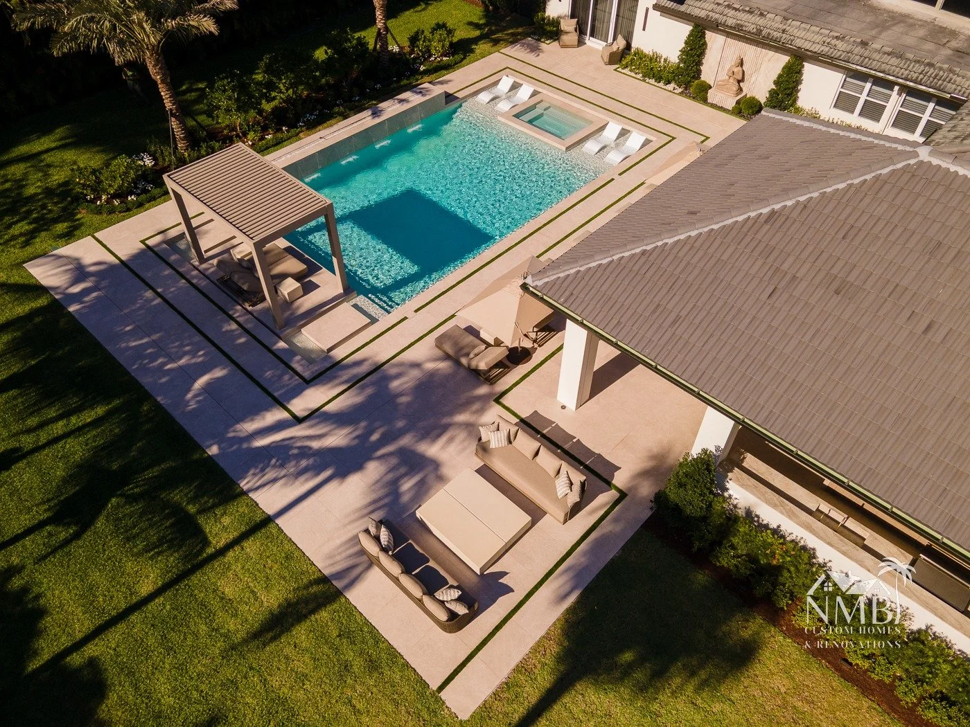 While this weekend marks the unofficial start of summer, this pool is officially the only place to be for the next few months (and every month after that)!!!☀😎🏊🌴👙

 #madebynmb #customhomes #poolside #summer #BocaRaton #LuxuryLiving