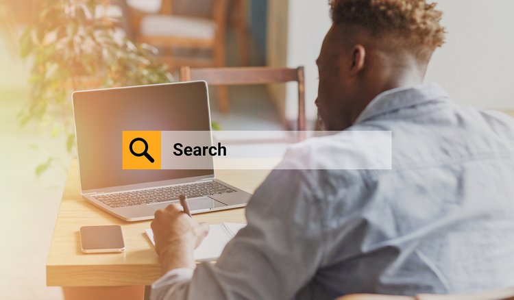 Person on computer with search engine icon. (65201, 65211, 65202). If you’re a counselor in Missouri, we can help you with SEO for mental health professionals.