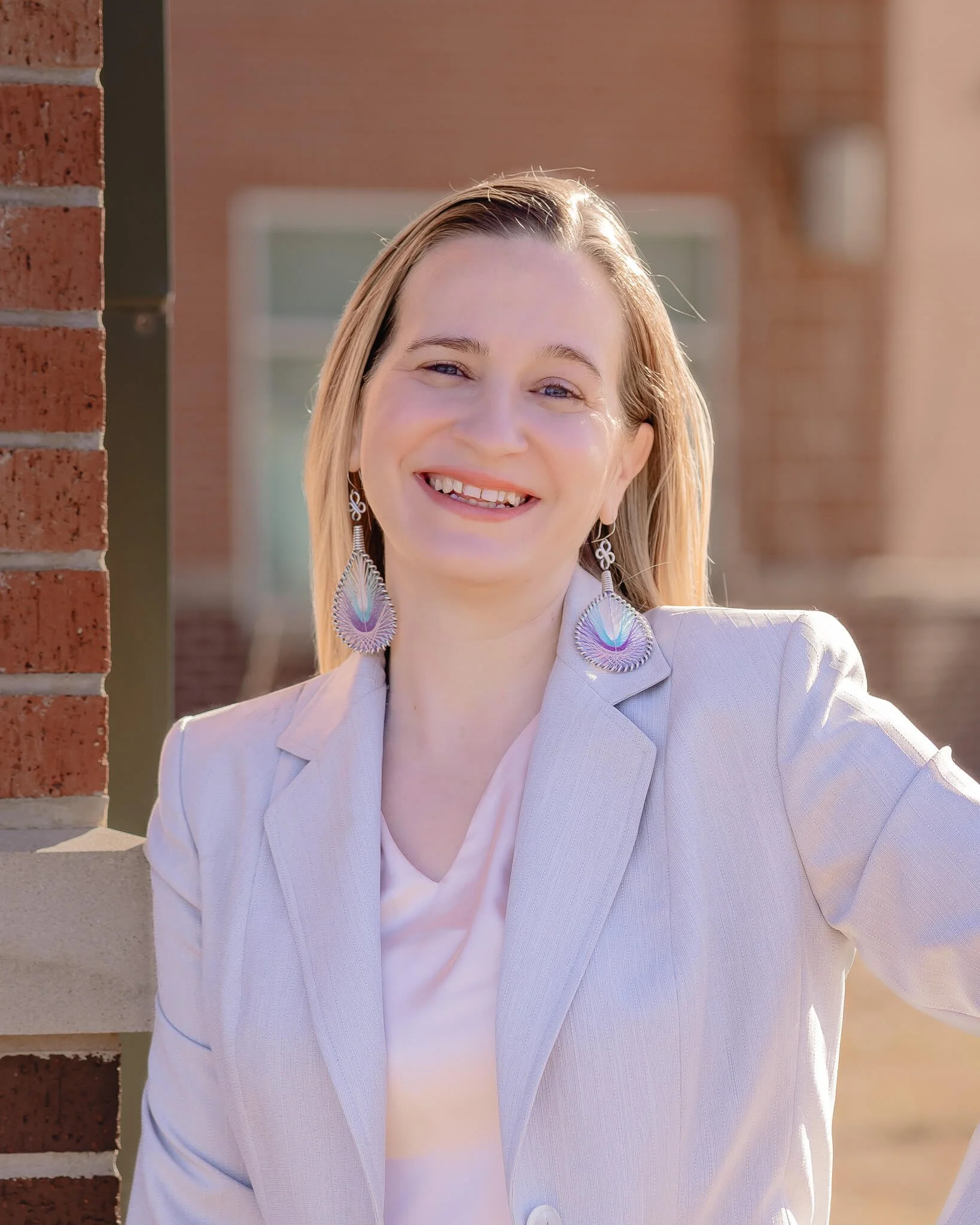 A photo of Jessica Oliver, Founder of Aspire Counselilng, and trauma therapist for teens and college students