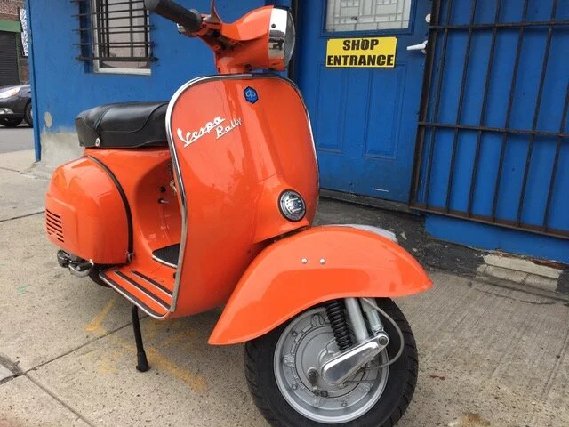 A restored vintage Vespa Rally