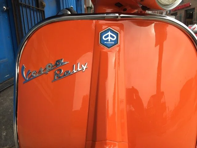 A restored vintage Vespa Rally