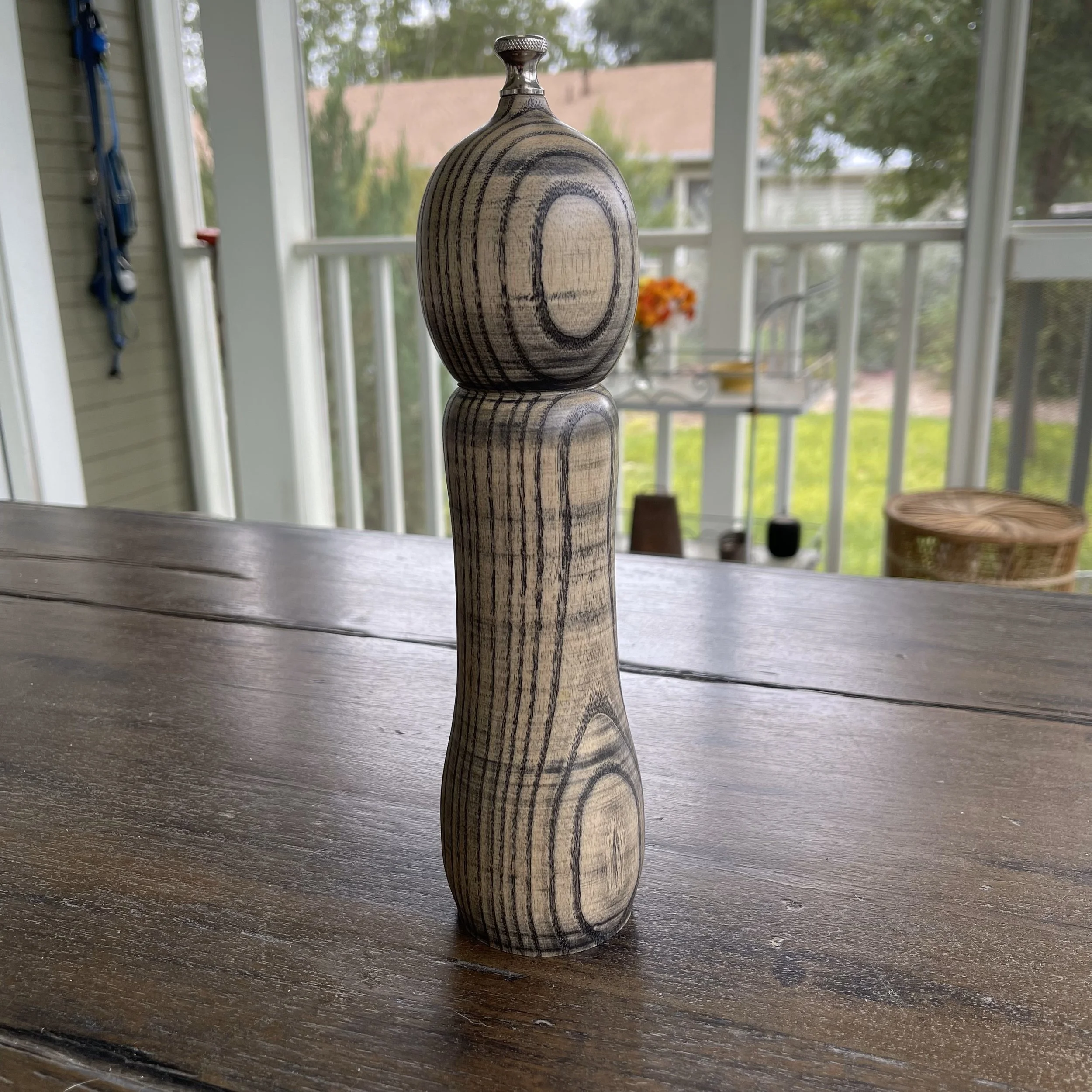 Handcrafted pepper mill made from reclaimed Allen Ash, stained to highlight the grain.