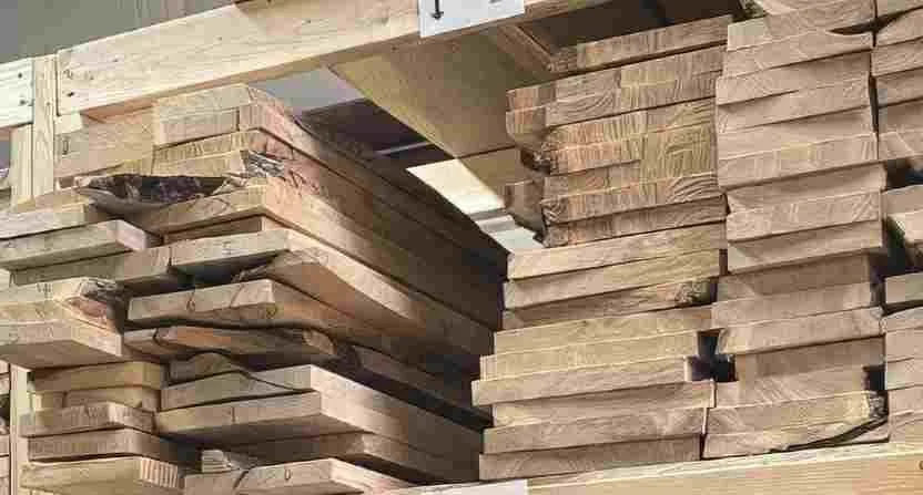 Stack of reclaimed Allen American Elm boards from Mr. Allen’s collection, preserved for new life in the shop.