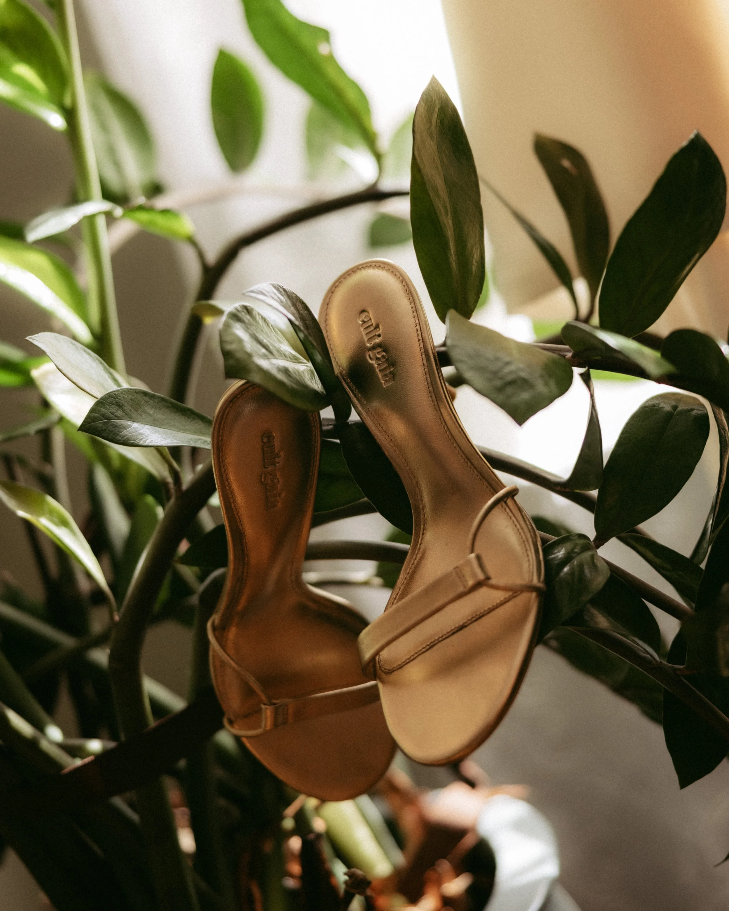 A pair of beige sandals with 