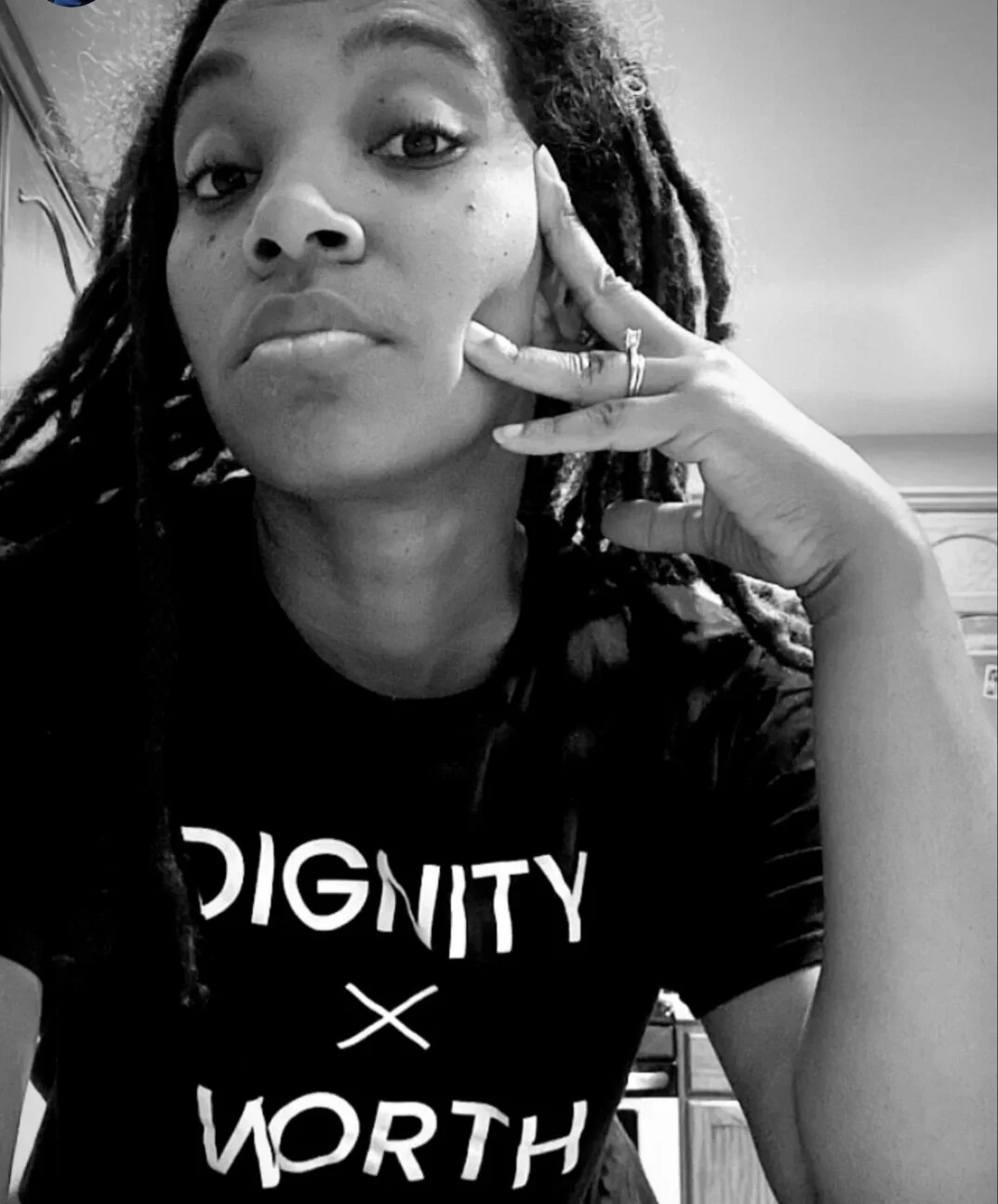 Woman in DIGNITY x WORTH Shirt