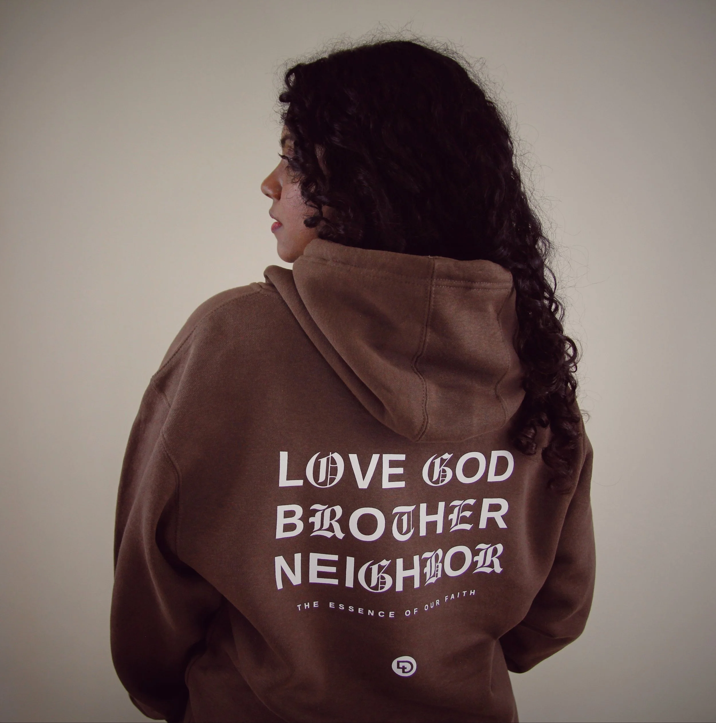 Back view of mocha Love 2.0 premium hoodie worn by woman