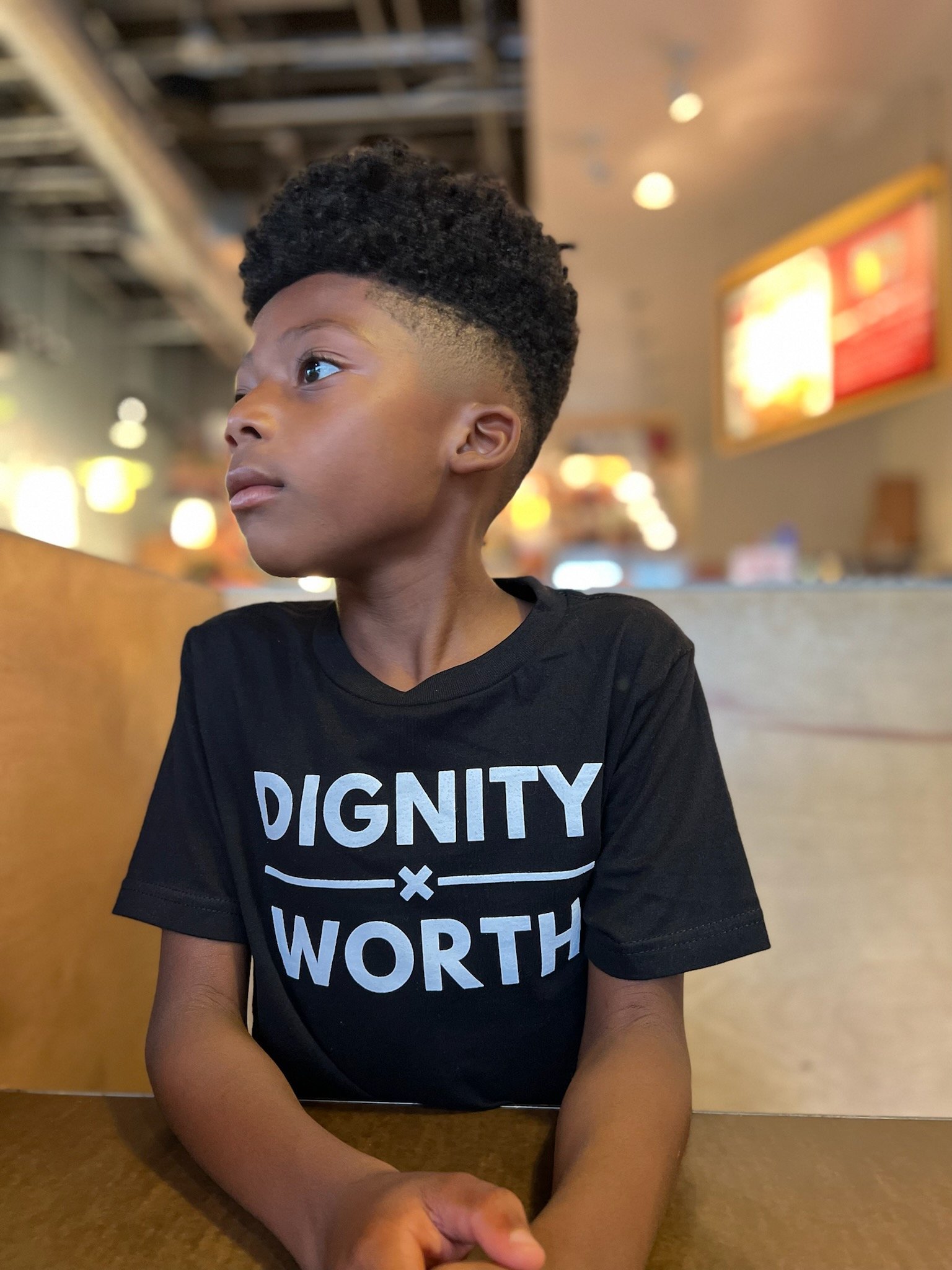 Kid in DIGNITY X WORTH Youth Classic Shirt