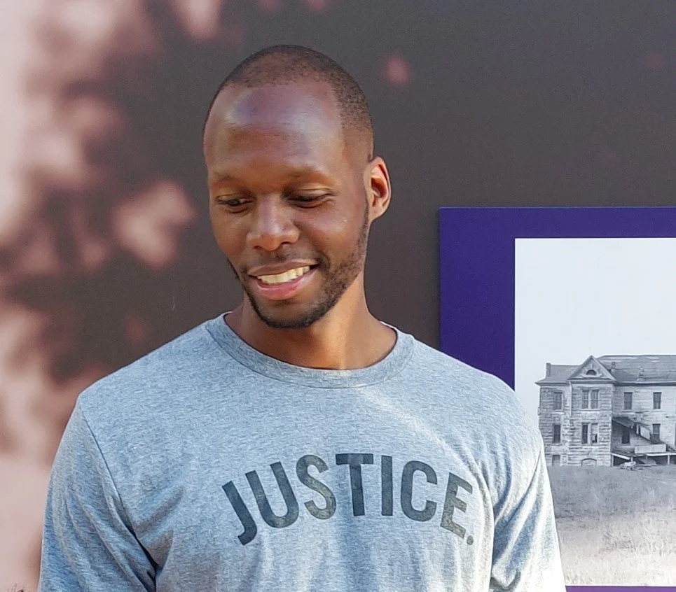 Man in graphite JUSTICE. Shirt