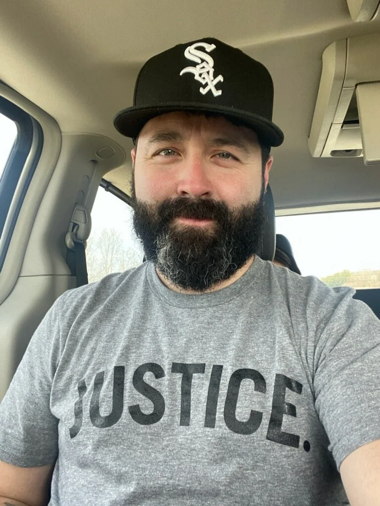 Man in graphite JUSTICE. Shirt