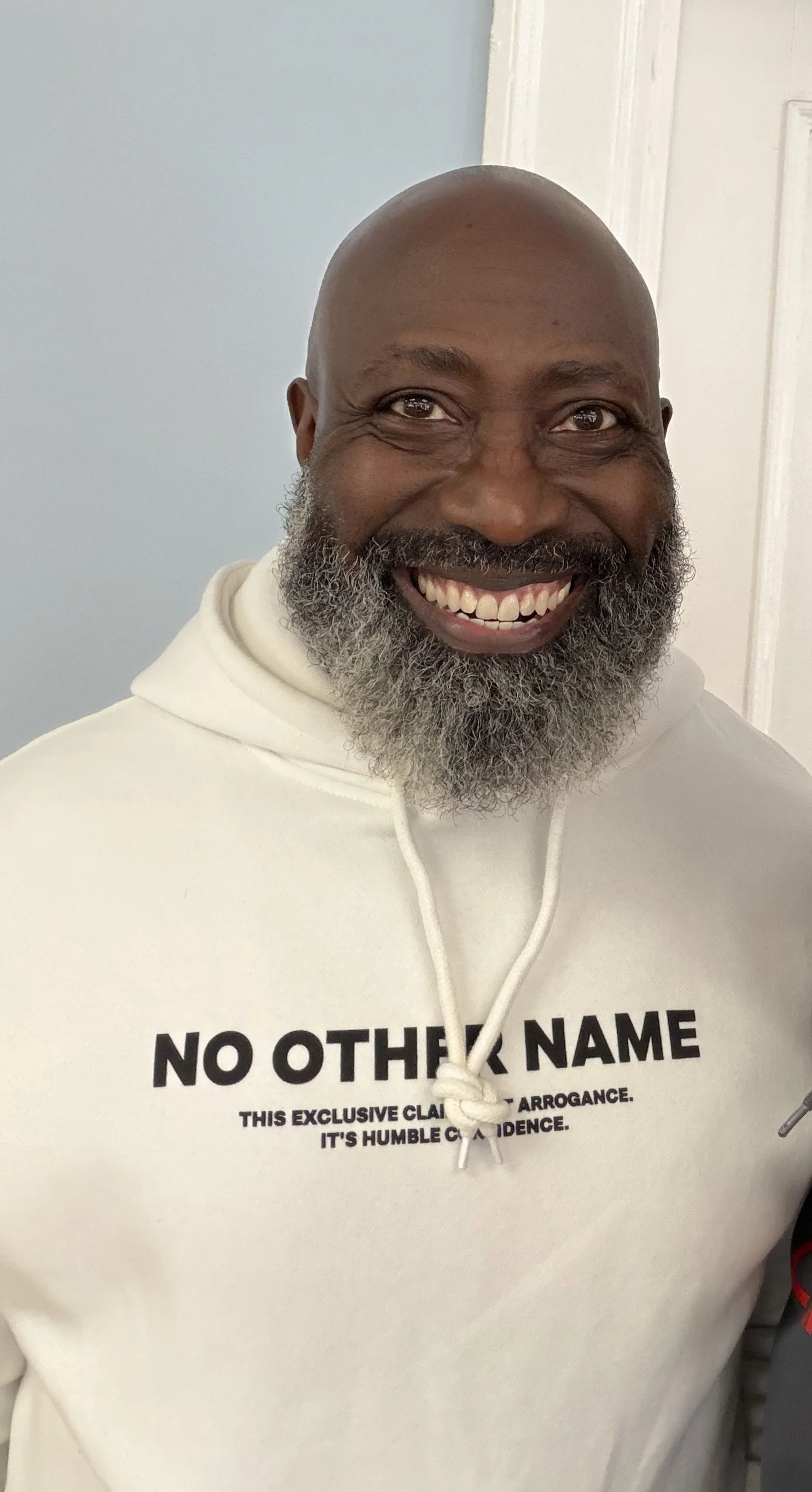 man wearing the off-white NO OTHER NAME hoodie - DIGNITY x WORTH