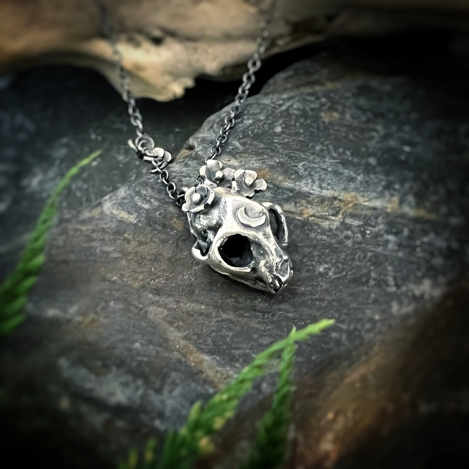 Cat shop skull pendant