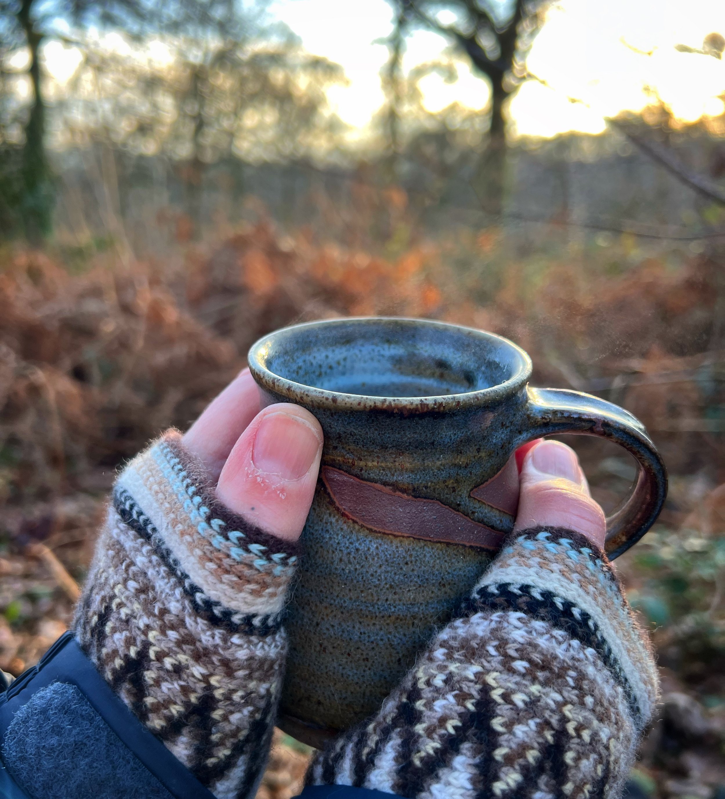 Drinking ceremonial Cacao in the woods