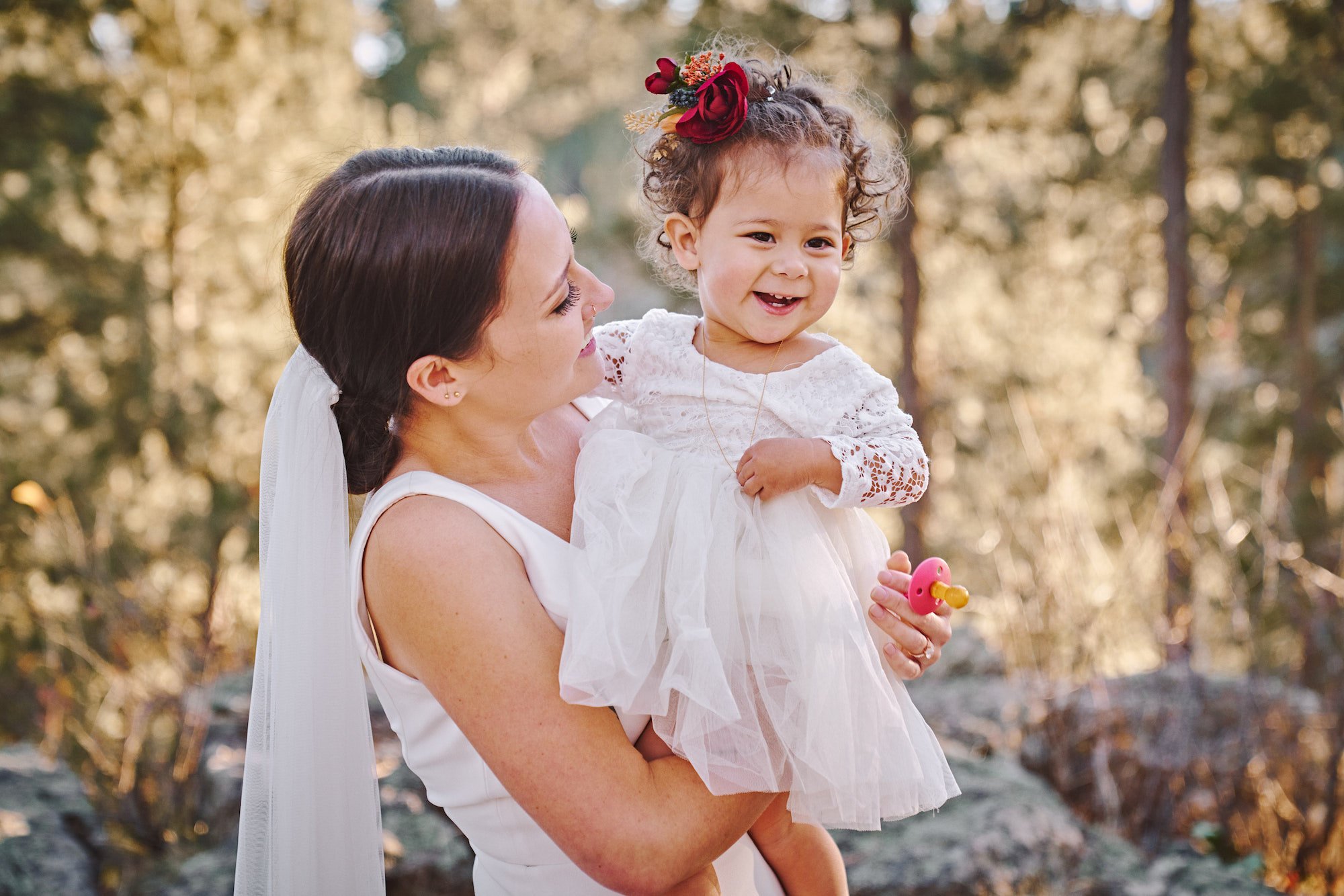 Bride holding flower girl (Copy)