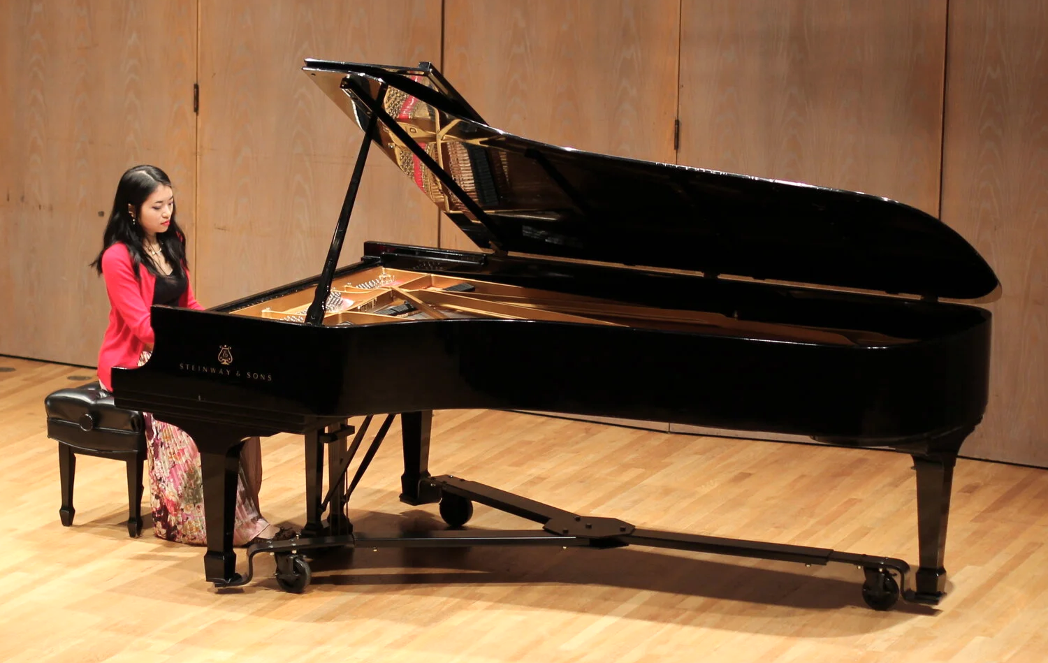 season performing on a steinway