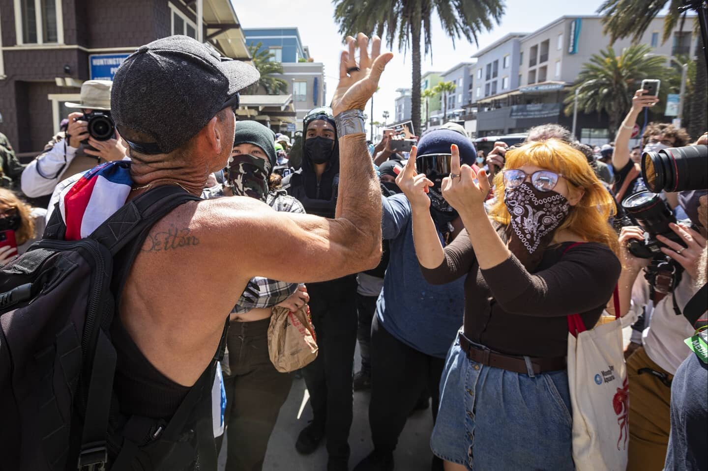 Middle fingers, horses, and civil unrest. Just another day at the office. 

Authorities eventually declared an unlawful assembly after things got out of hand last Sunday in Huntington Beach. I was there, and I still couldn't tell you what happened. M