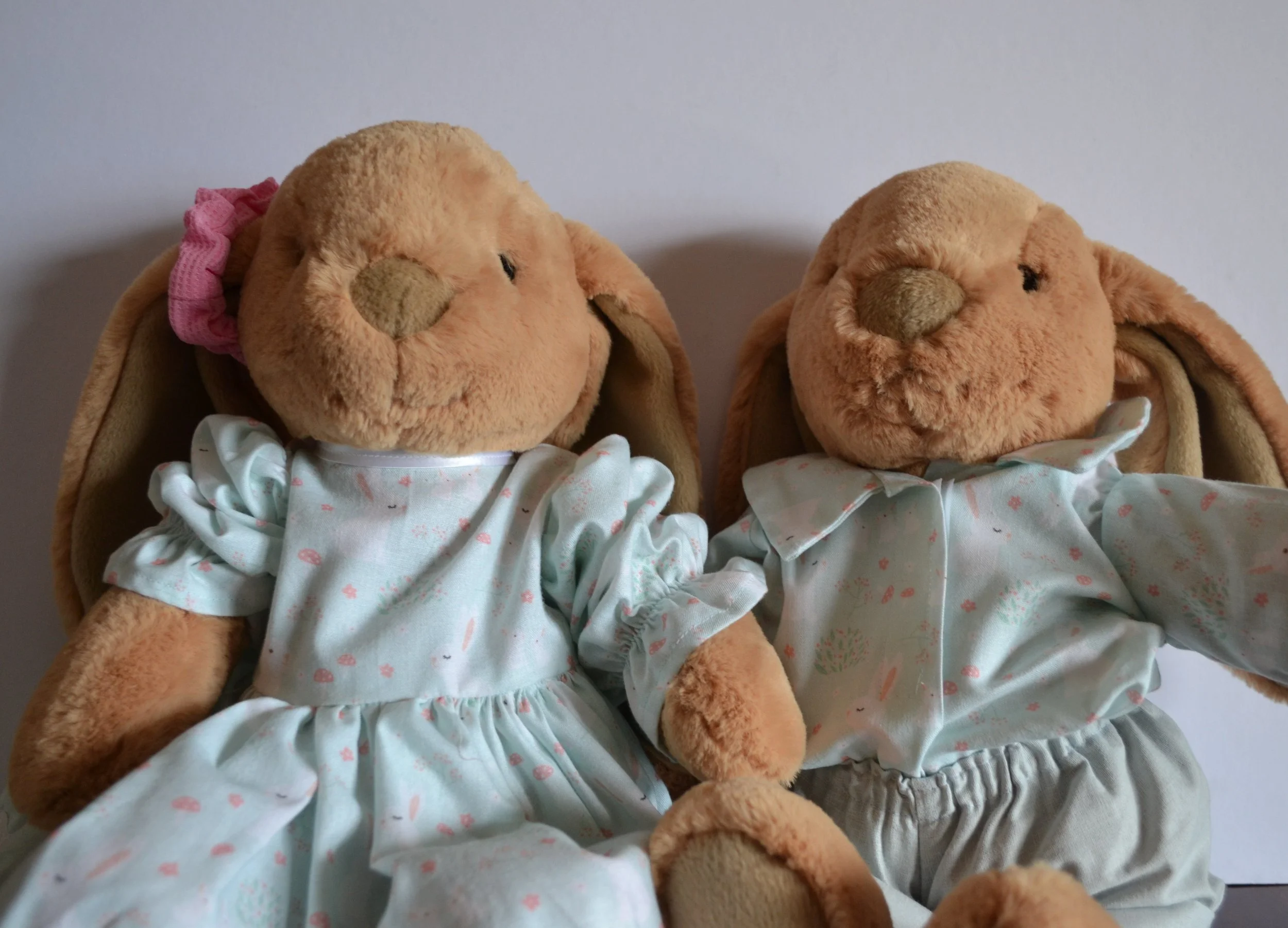 Boy and girl bunnies soft green.JPG