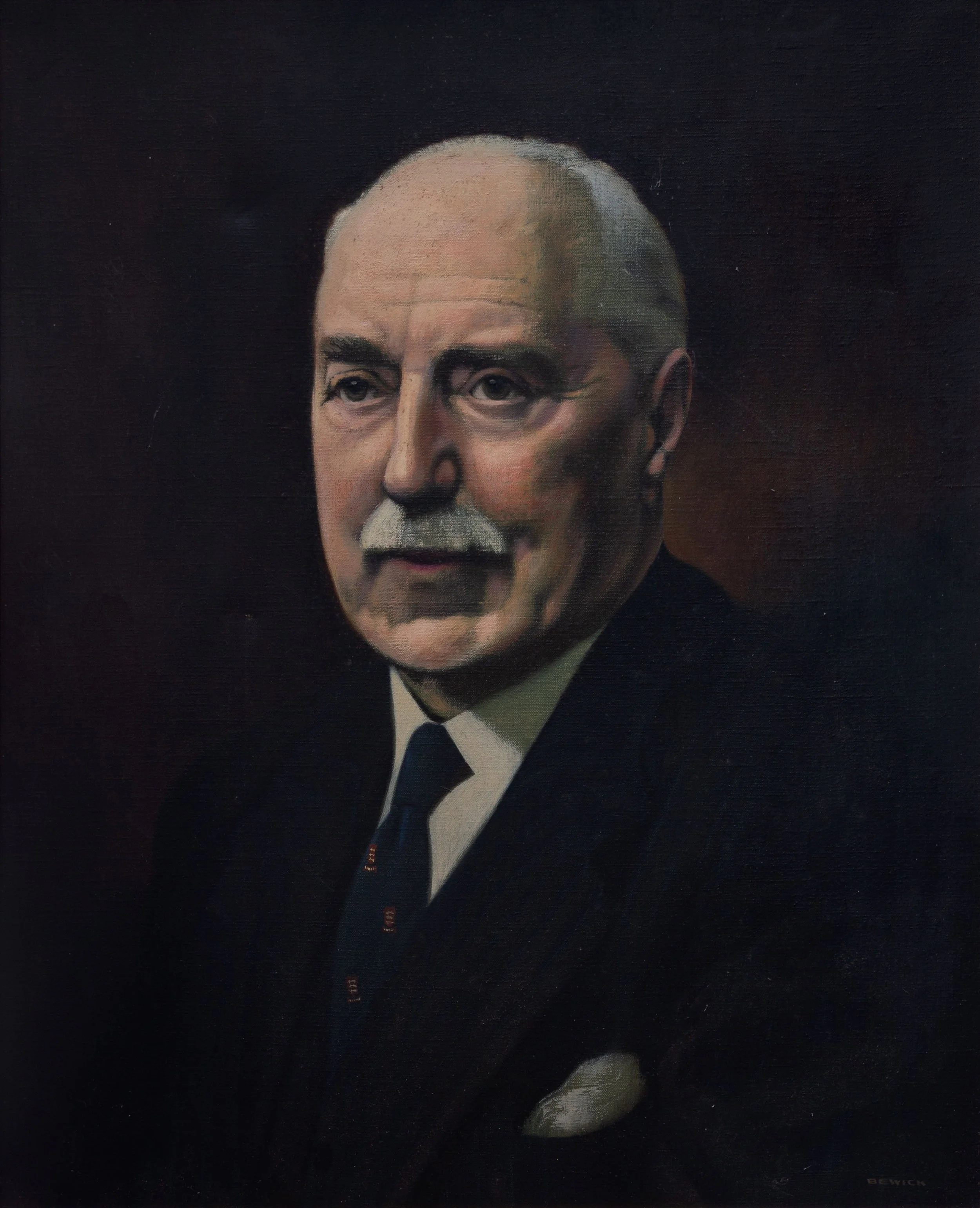 Painting of a man with white hair and a mustache against a dark background, dressed in a formal black suit with a white shirt and black tie, with the artist's name, Behr, faintly visible at the bottom.