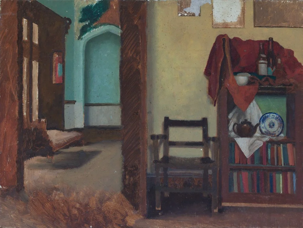 An interior scene of a room with a doorway leading to another room; there is a chair and a bookcase with various items including a teapot, bowl, bottles, and books, with some fabric draped over the furniture.