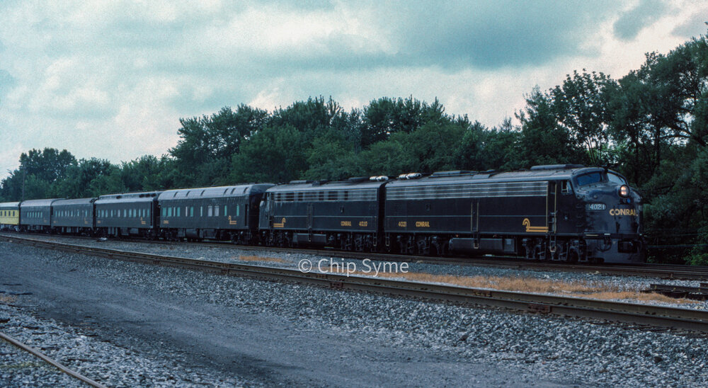 Conrail 4021 with CNW Business Cars 1987