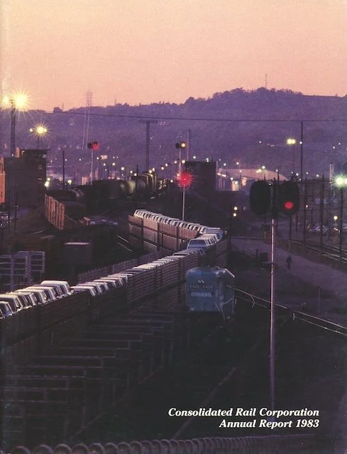 Conrail Annual Report 1983 - The 1983 Conrail Annual Report reflects the confident and visually distinctive style that defined the railroad’s reports during the 1980s. Featuring a single, striking photograph on a dedicated page, the report focuses he