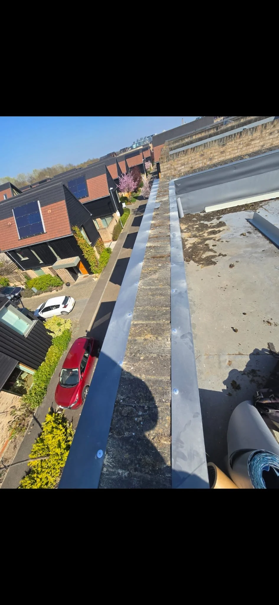 Flat roof repair on Royal Way Trumpington laminated metals