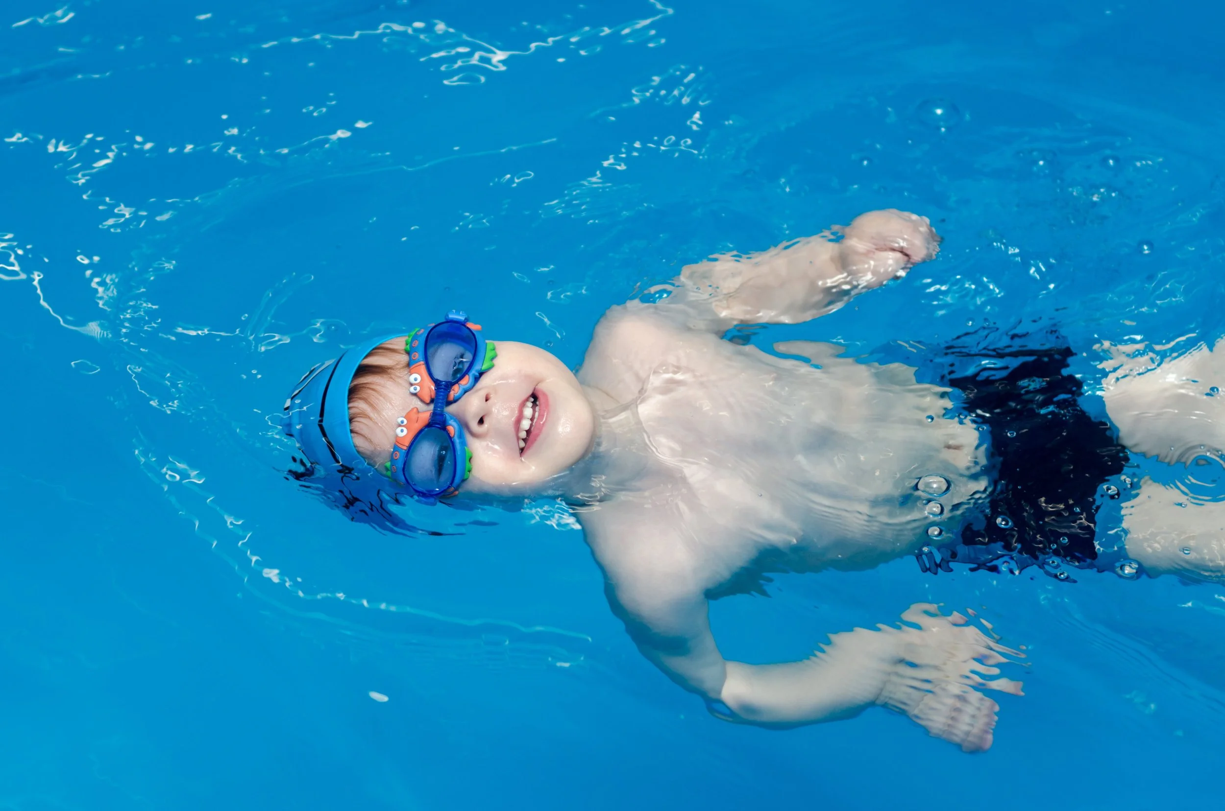 SEN child swimming in water