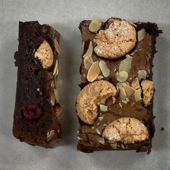 STOP THE PRESS the Amaretto &amp; Amaretti Cherry Brownie is BAAACK! 

Guess who's making a triumphant return as our CAKE OF THE DAY? You asked, you begged, and we listened! Say hello again to the sensational...

Cherry, Amaretto &amp; Amaretti Brown