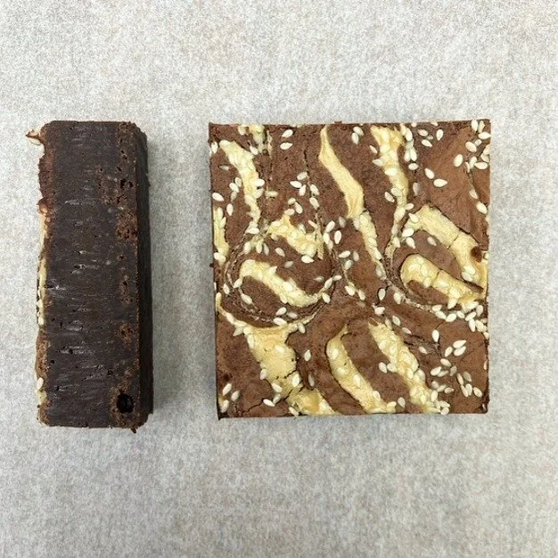 FRIYAY'S CAKE OF THE DAY

TAHINI &amp; DATE BROWNIE

We've taken our signature, full-throttle, gooey chocolate brownie mix and elevated it with a secret weapon: creamy tahini for depth and chopped, sweet dates for an unbelievably moist, unctuous text