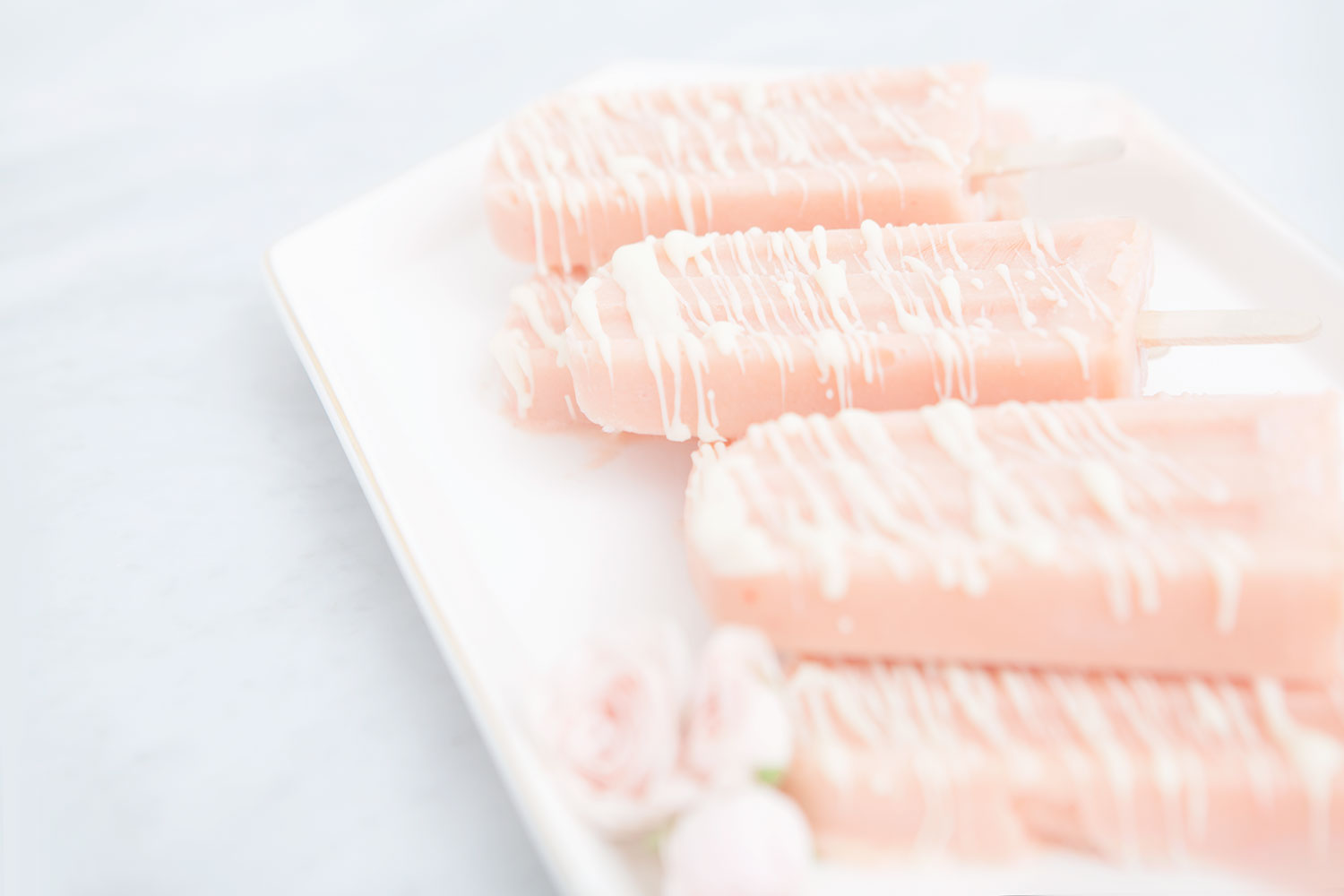 White Chocolate Drizzled Peach Popsicles