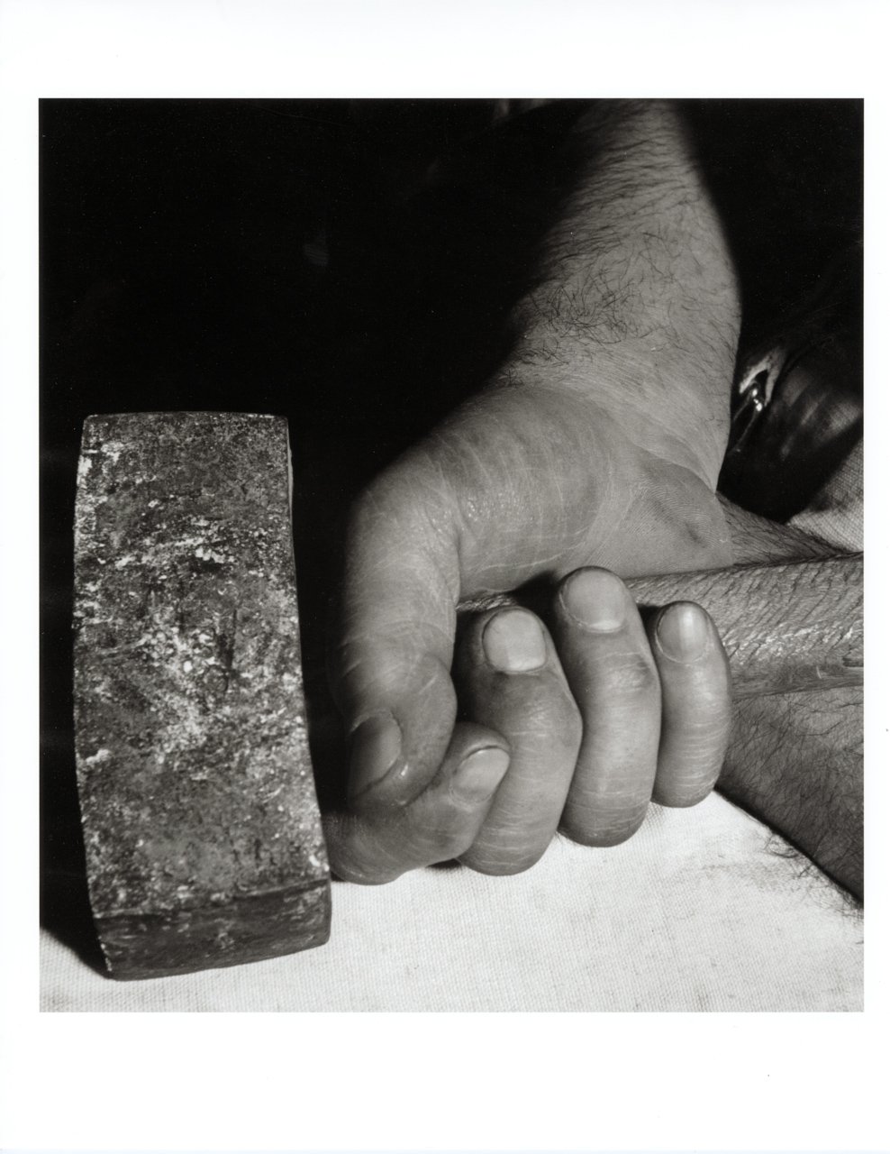 Brancusi's hand holding hammer.