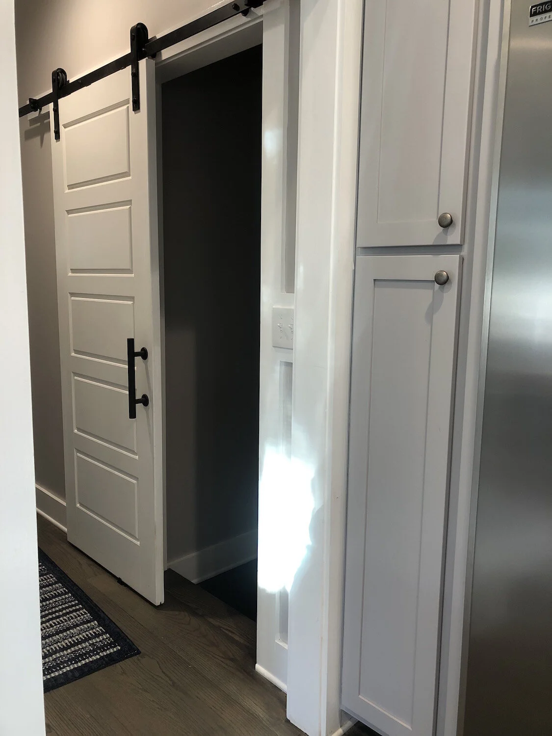 Barn-style sliding door detail for a Custom Kitchen Renovation Project.
