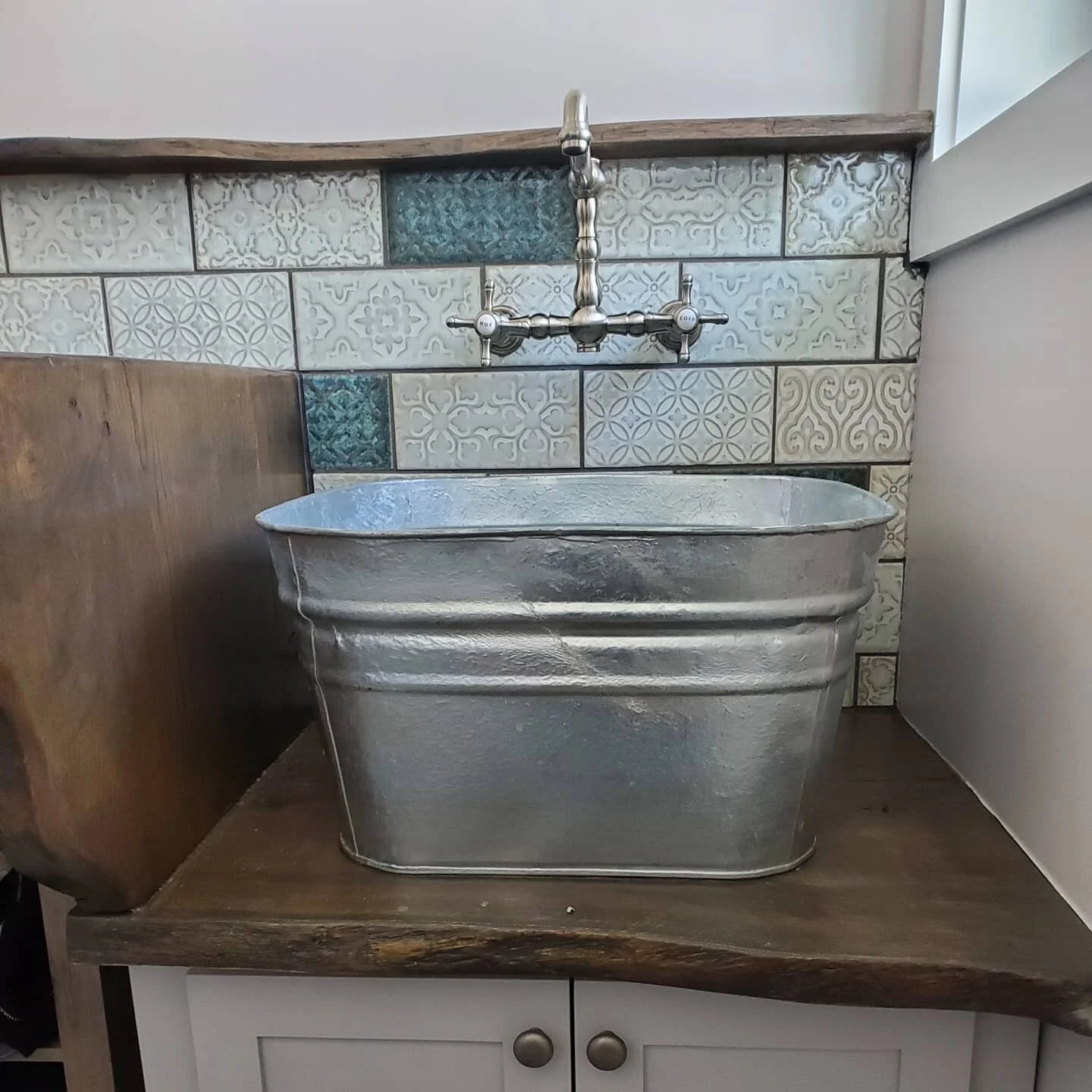 Unique sink detail for a smart mudroom renovation for an adventurous family in Blacksburg VA. 