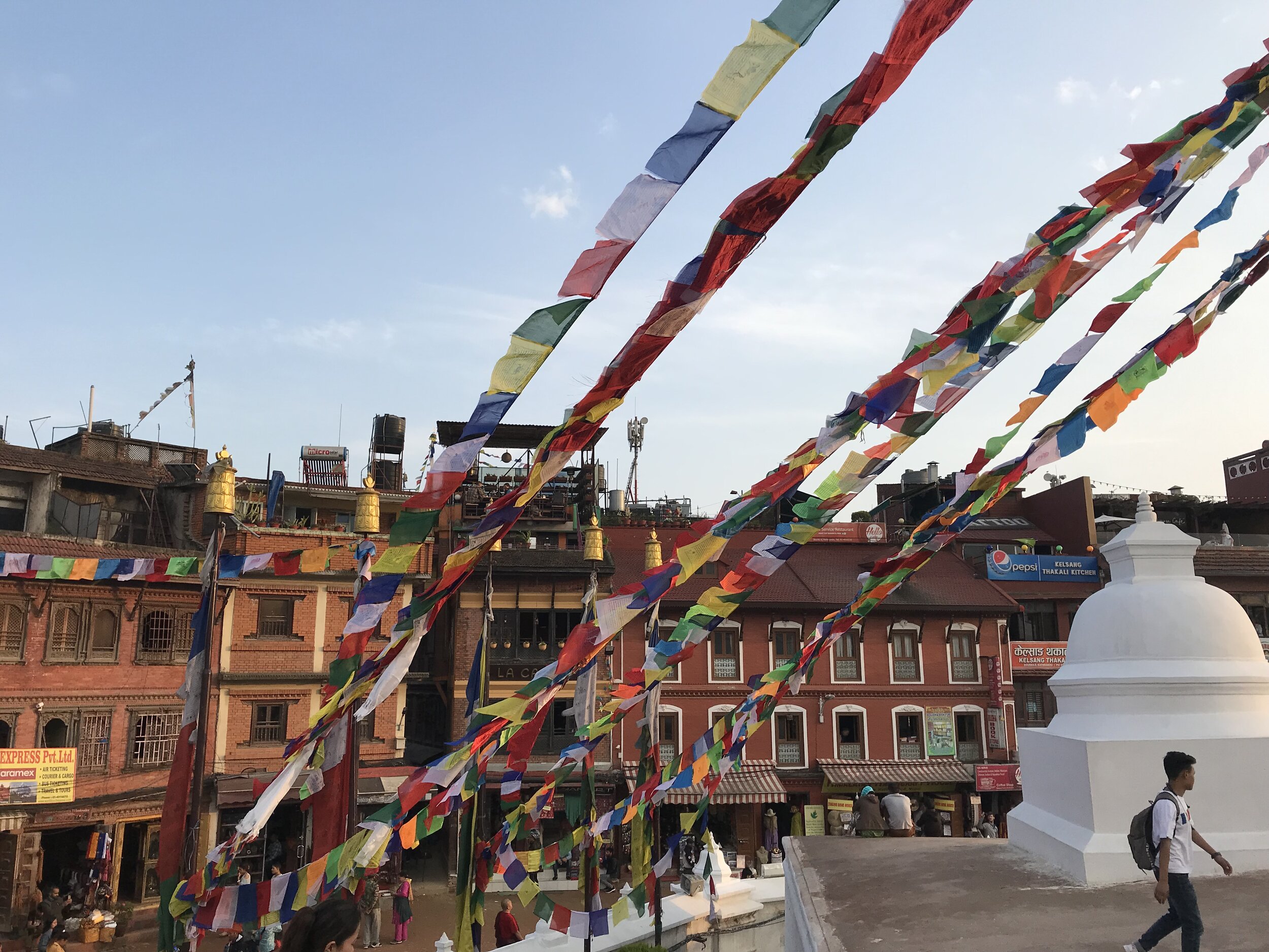 Houses and shops encircle Boudhanath.