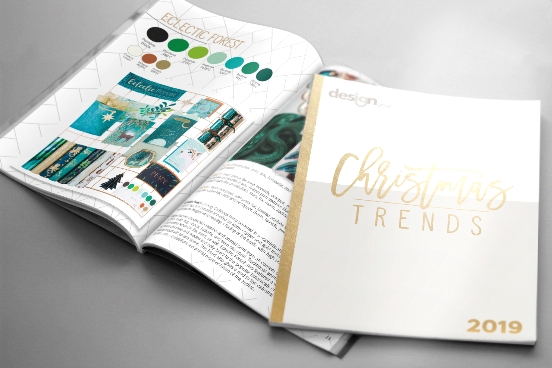 Open magazine displaying Christmas trends for 2019, featuring color palettes, festive decorations, and holiday-themed design ideas.