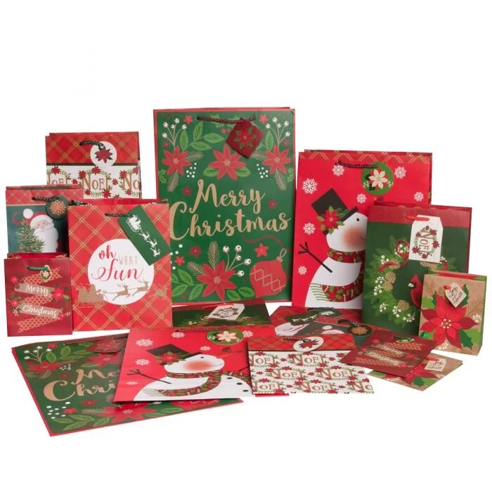  assortment of Christmas gift bags and cards with festive holiday designs including snowmen, poinsettias, reindeer, and holiday greetings