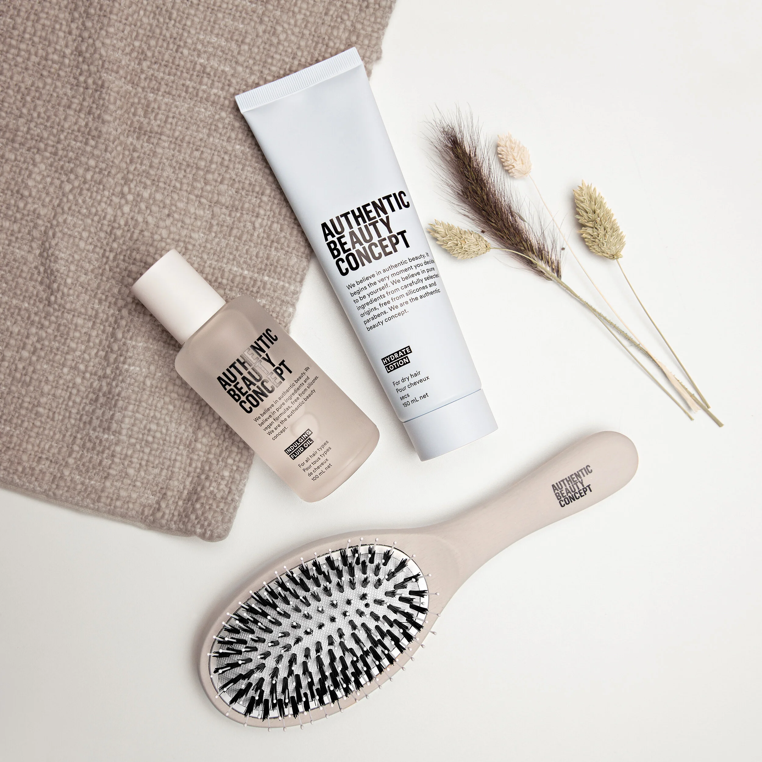 Flatlay_Authentic_Beauty_Concept_Indulging_fluid_oil_hydrate_lotion_Brush.jpg