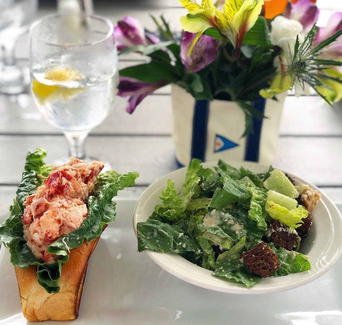 Nothing says summer like a &hellip; Lobster roll + caesar salad. Lunchtime at the marina, watching the sailboats come in and out and savoring every sweet bite🦞⛵️