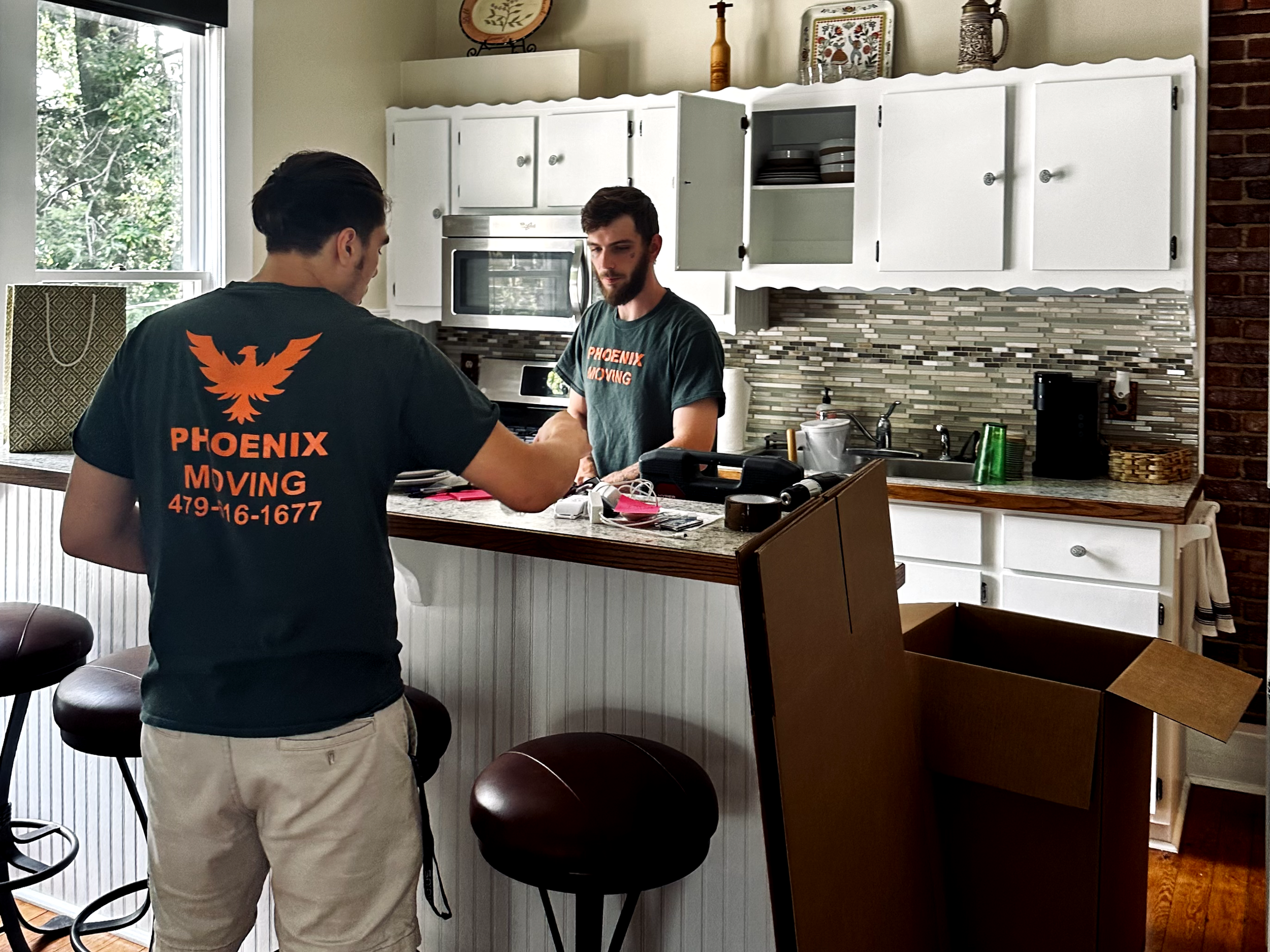 Here the crew is packing a kitchen with our full service packing option