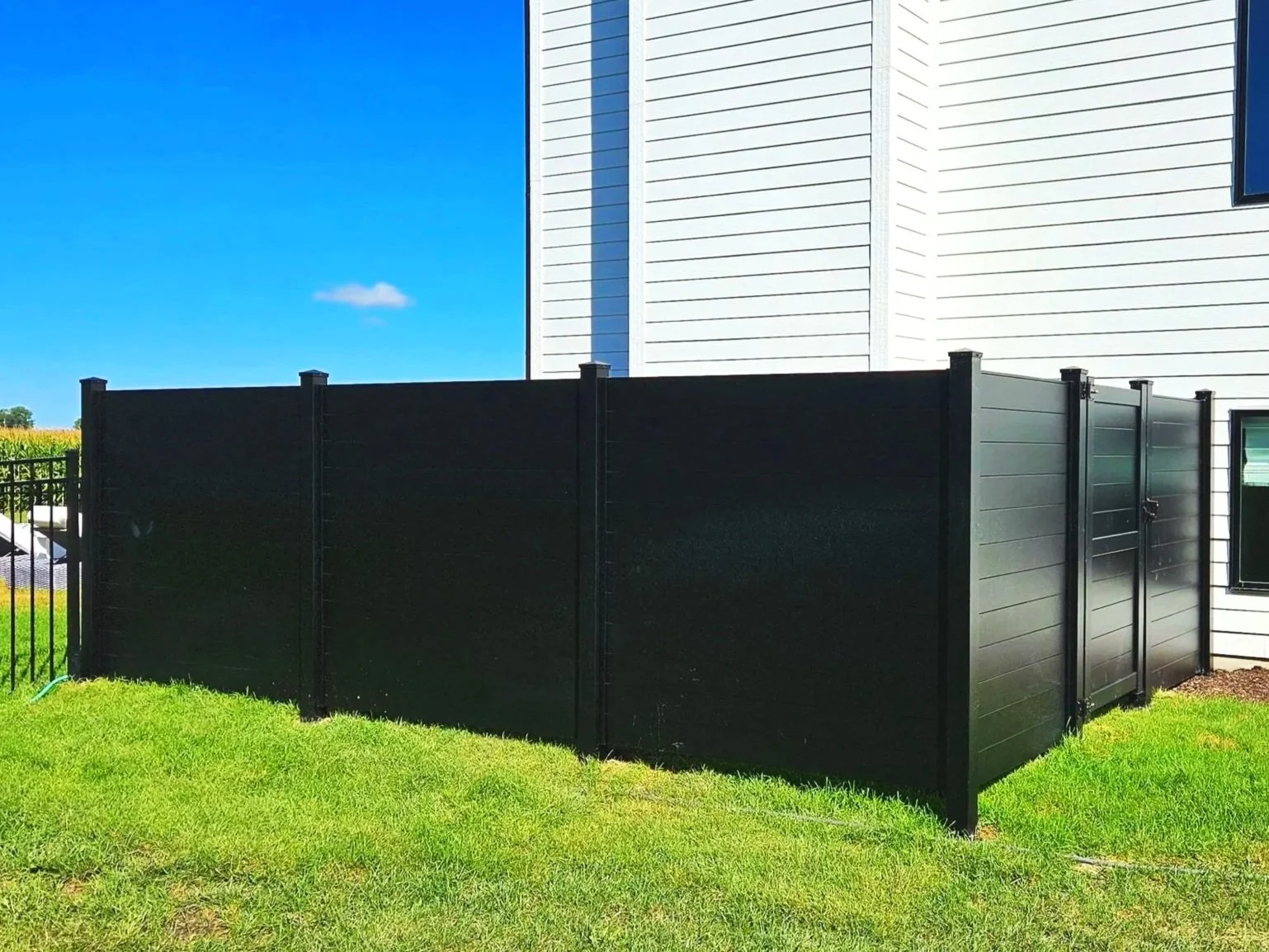 Aluminum horizontal privacy fence for DJK Custom Homes in Plainfield, IL