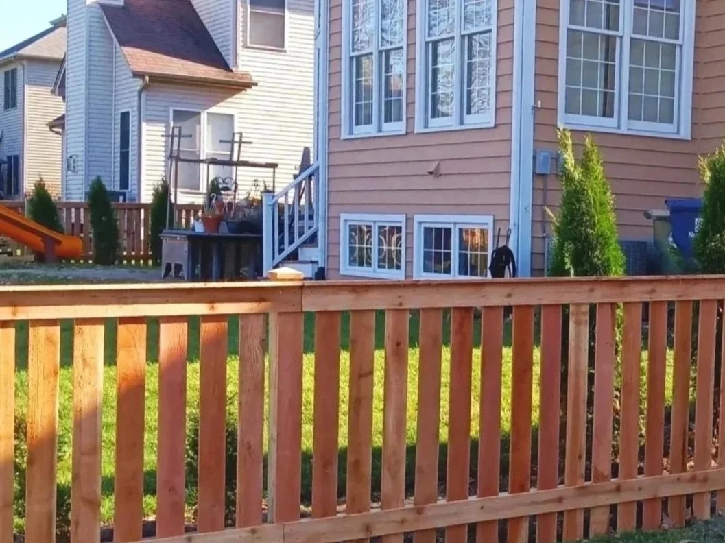 Red cedar picket traditional fence in Naperville, IL