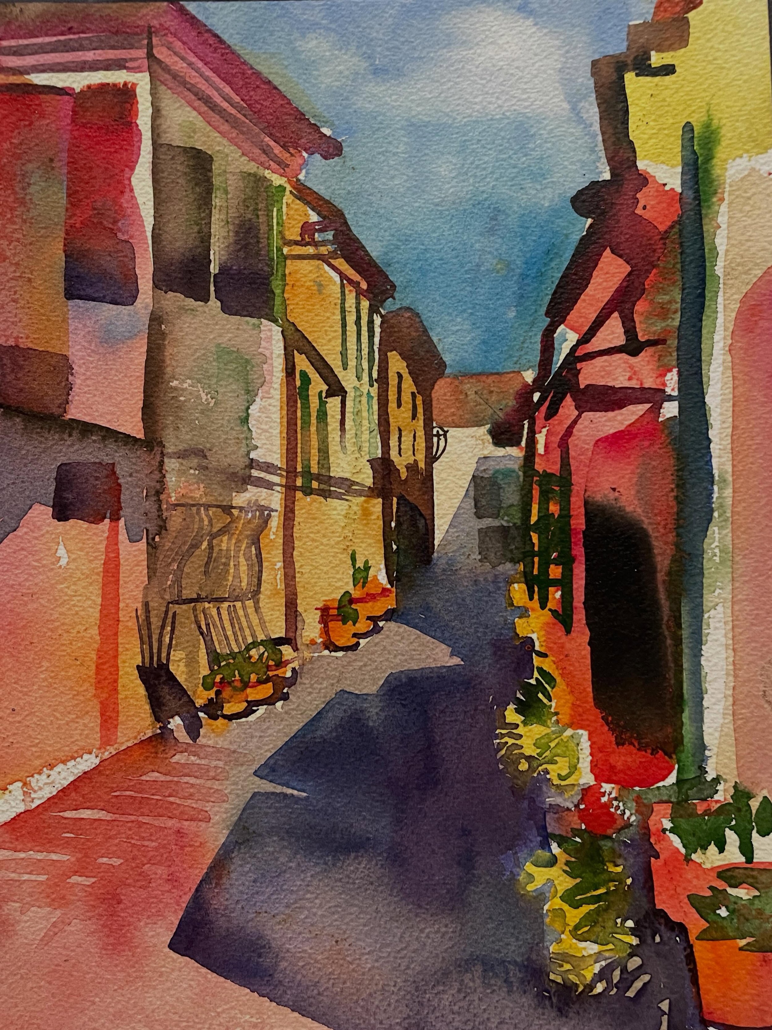 Sweet little alley in Sirolo. Painting outside sometimes requires just a little bit of discomfort. You can&rsquo;t see me 🙃but I am sitting on the pavement with my watercolors - all worth it!