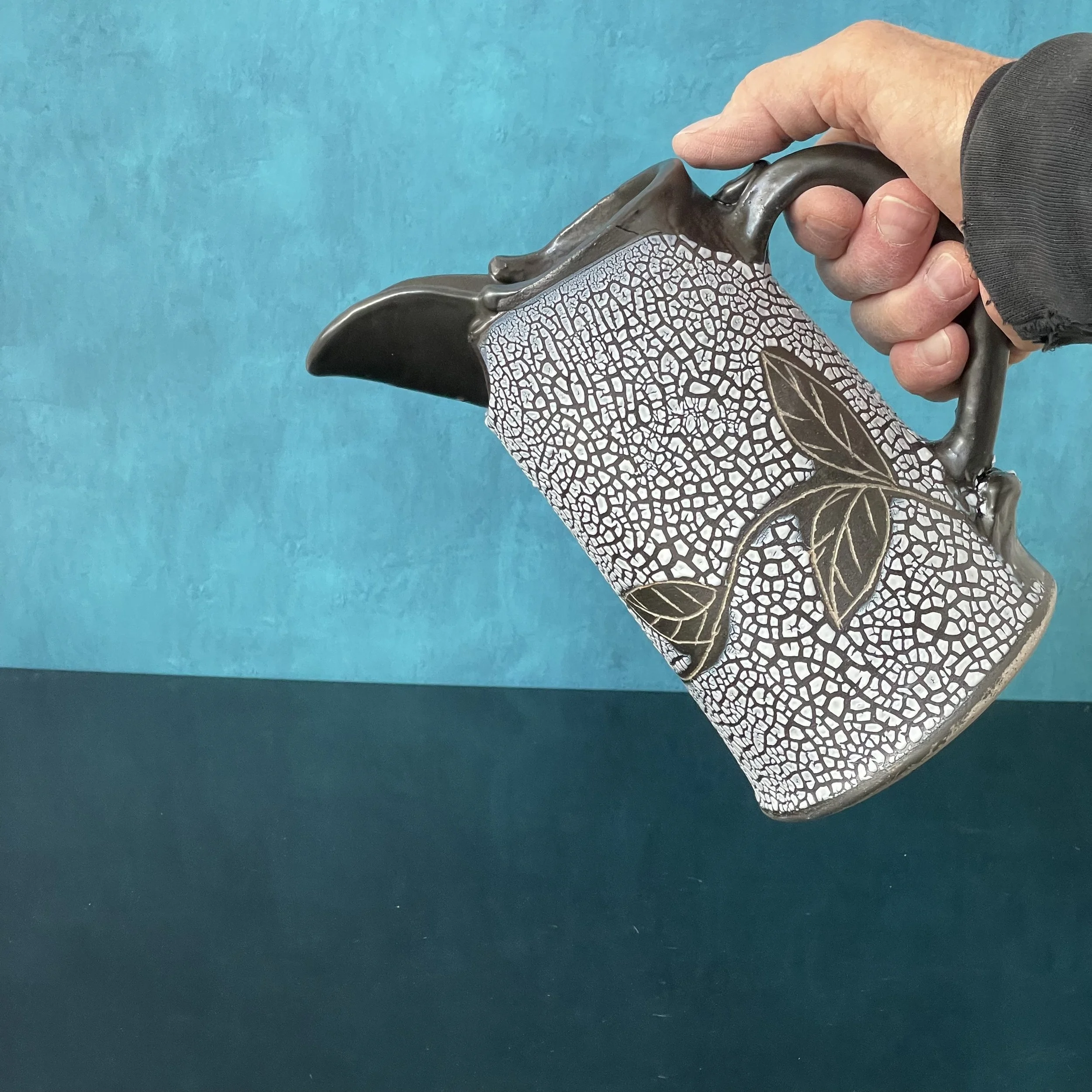 Leaf pitcher held