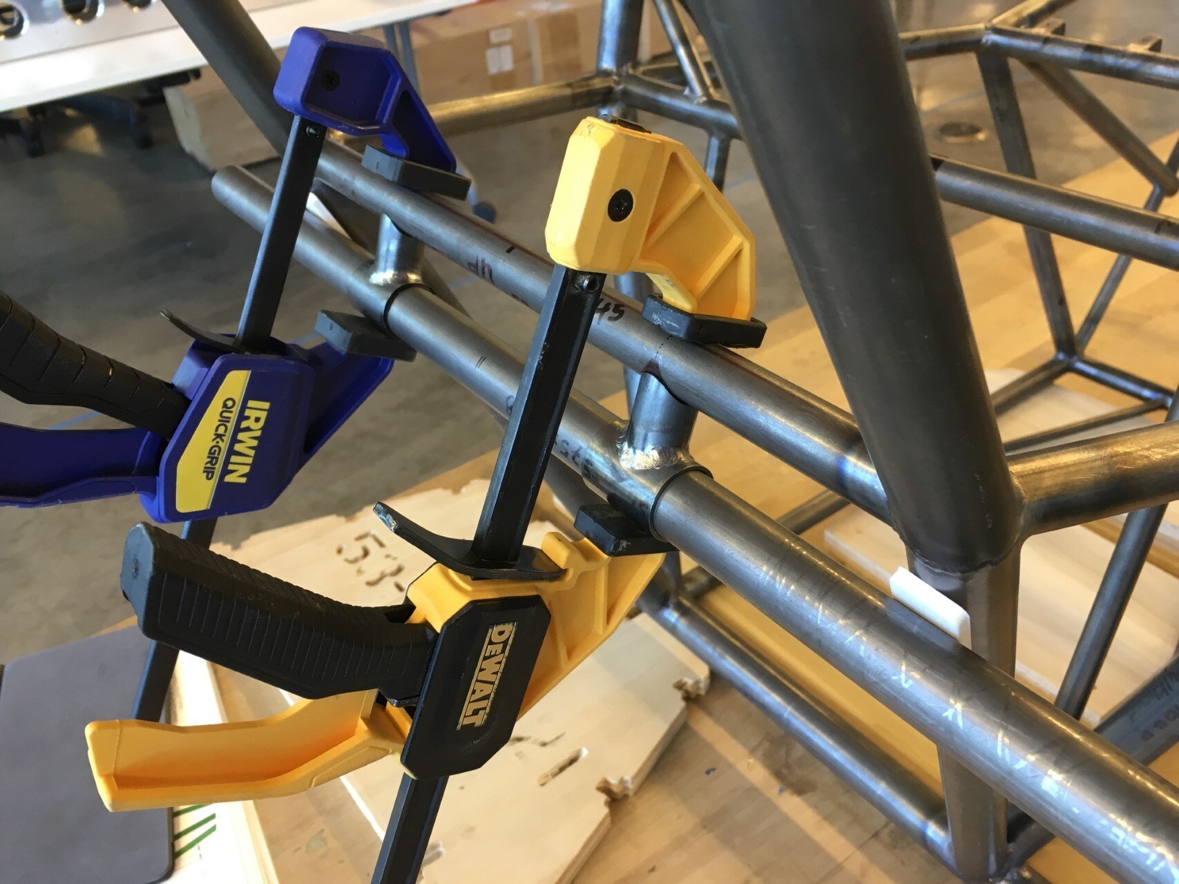   Aft bulkhead control mount standoffs are fitted and clamped into place for tack welding.  