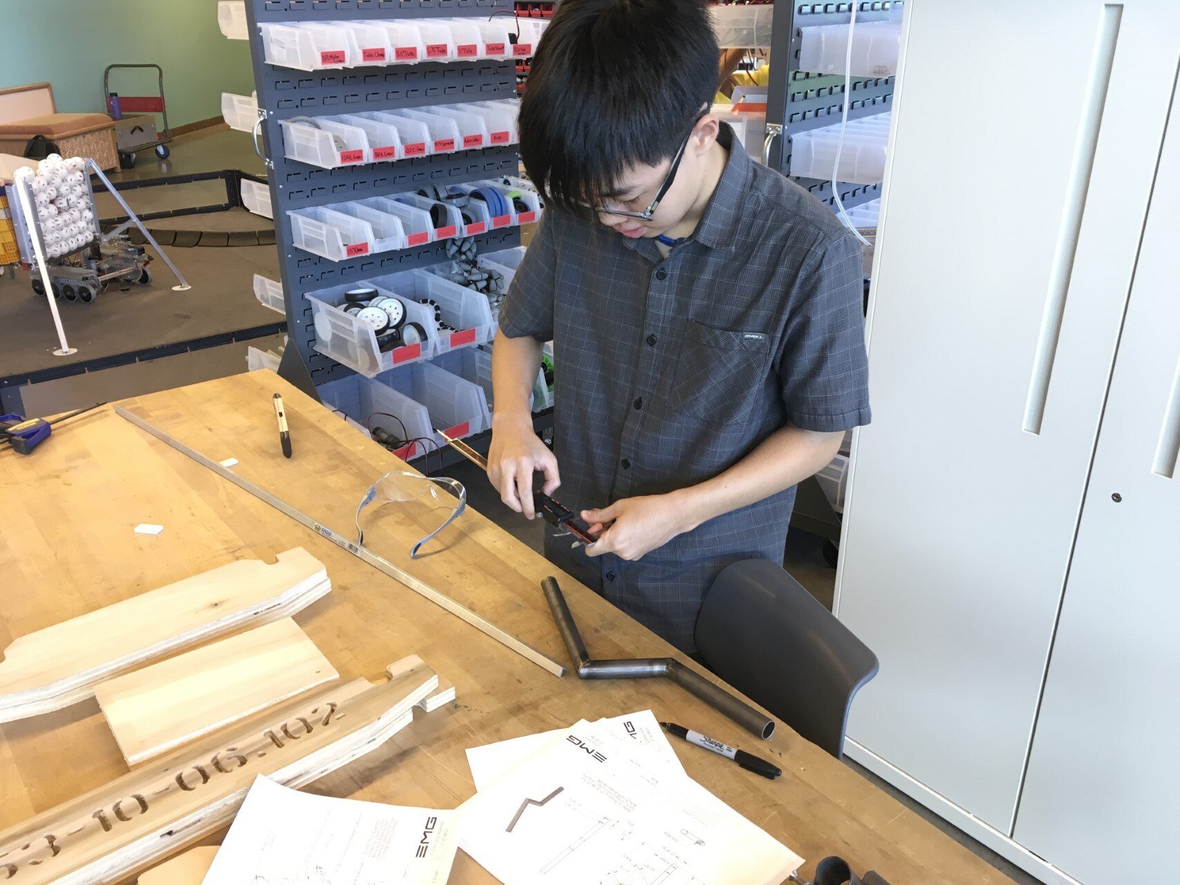   Locating holes to be drilled in control stick.  