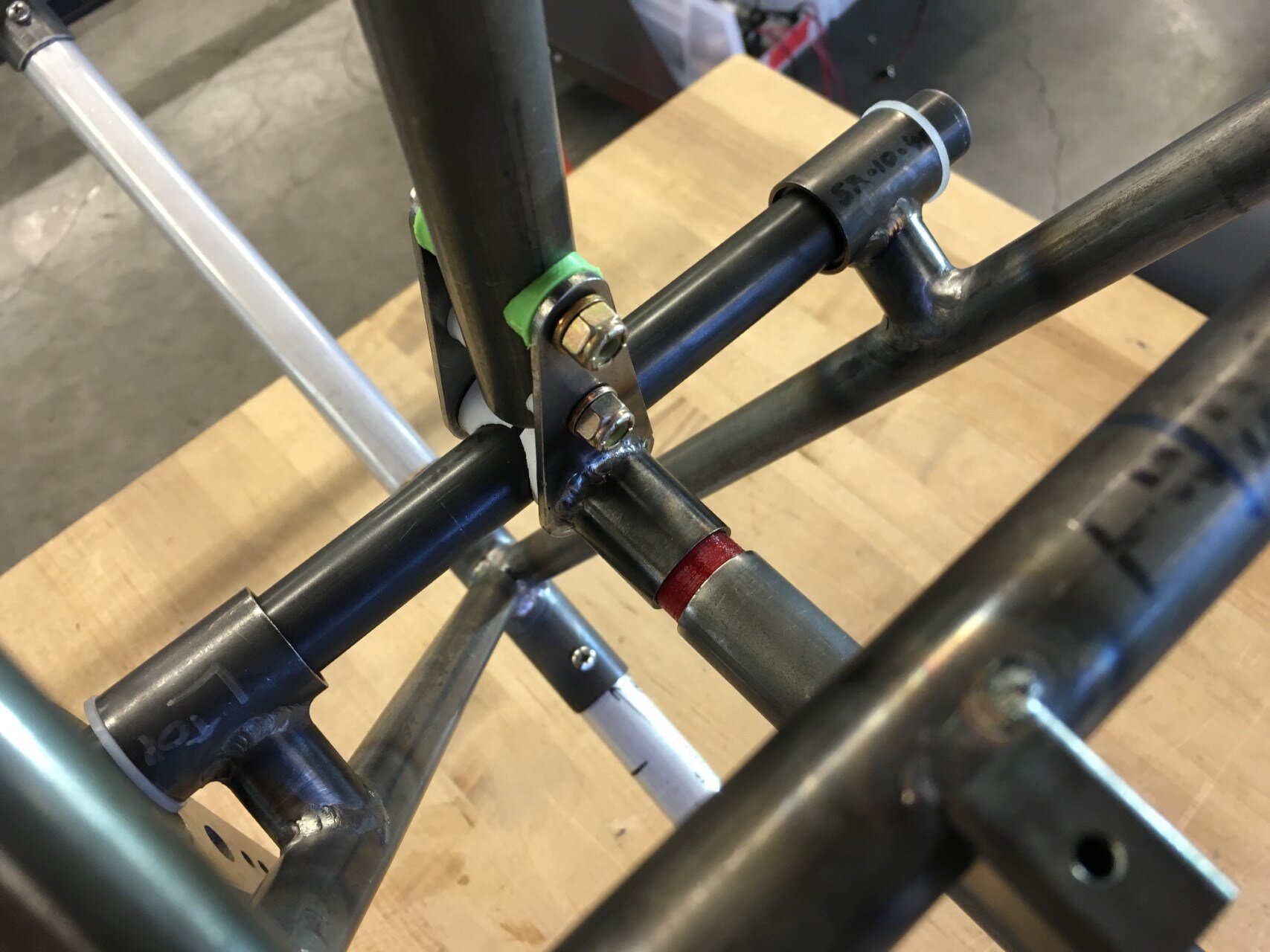   We 3D printed a temporary u-joint from red TPU flexible filament to couple the control stick with the aileron torque tube. This way we can test the movement of the system.  