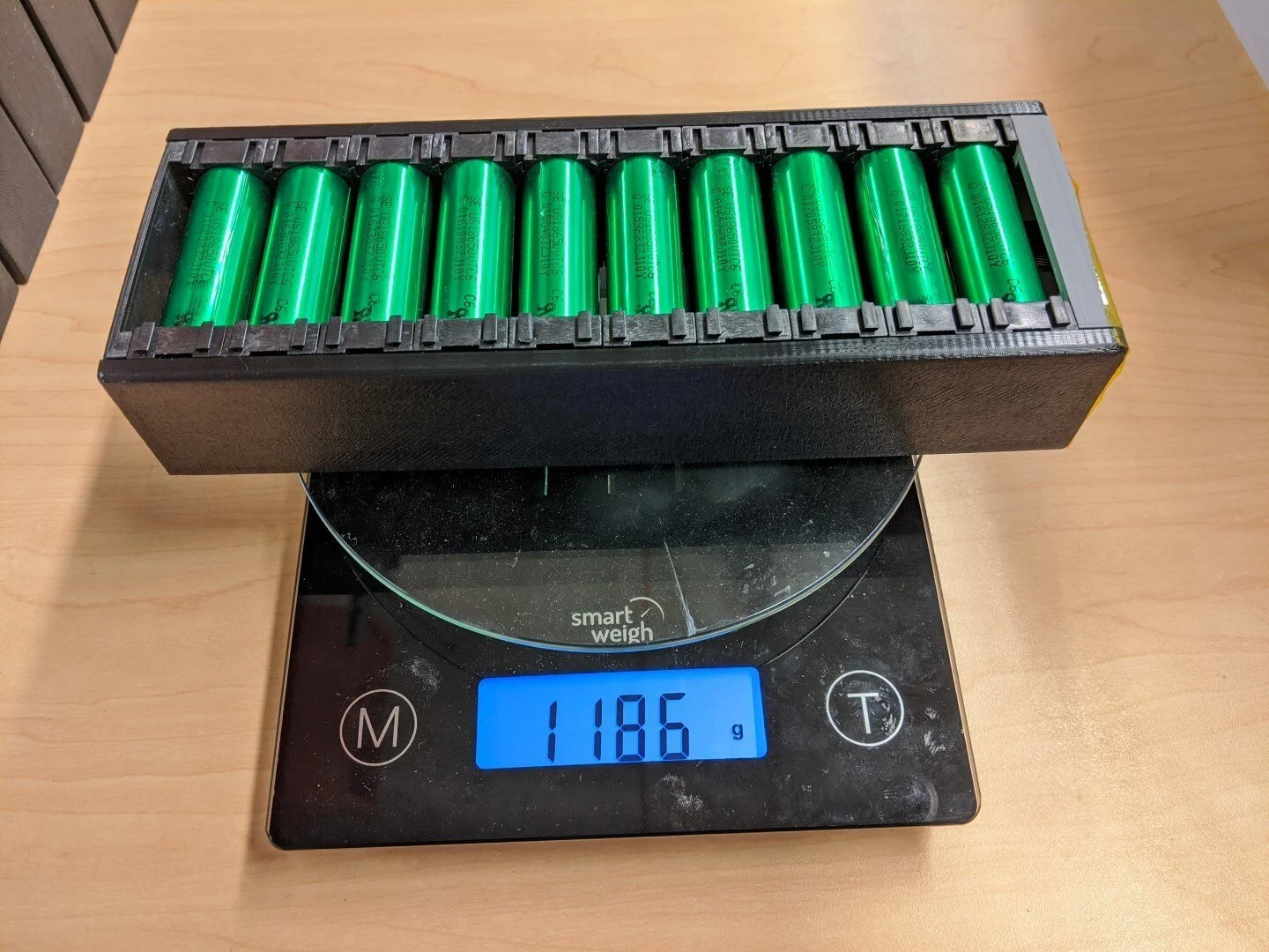 The all-up module weight of 1186g translates into a pack energy density of roughly 168Wh/kg (based on useable energy at 10A discharge). This will decrease some when we add in the weight of the enclosure.