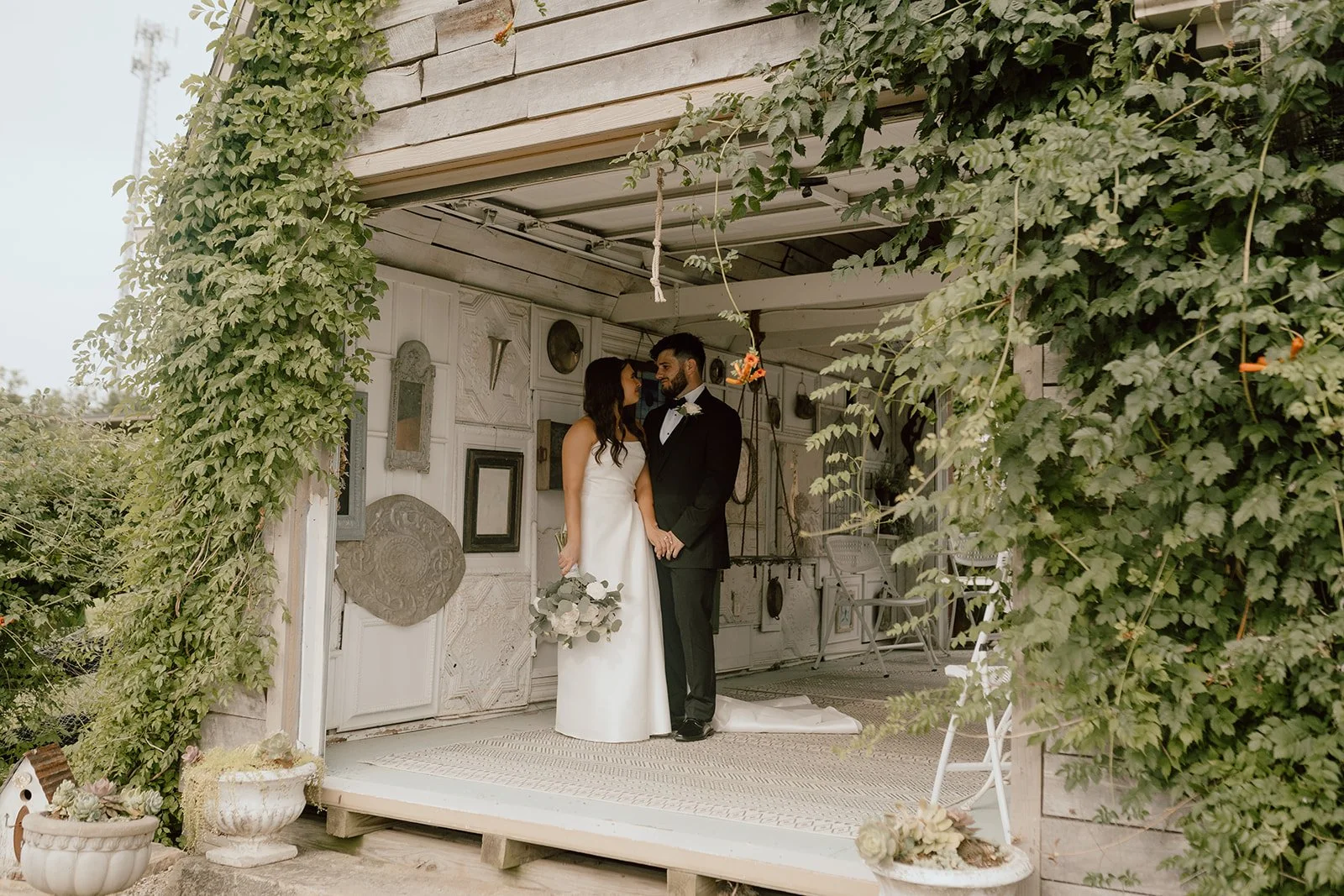 couple in vintage inspired garden shed