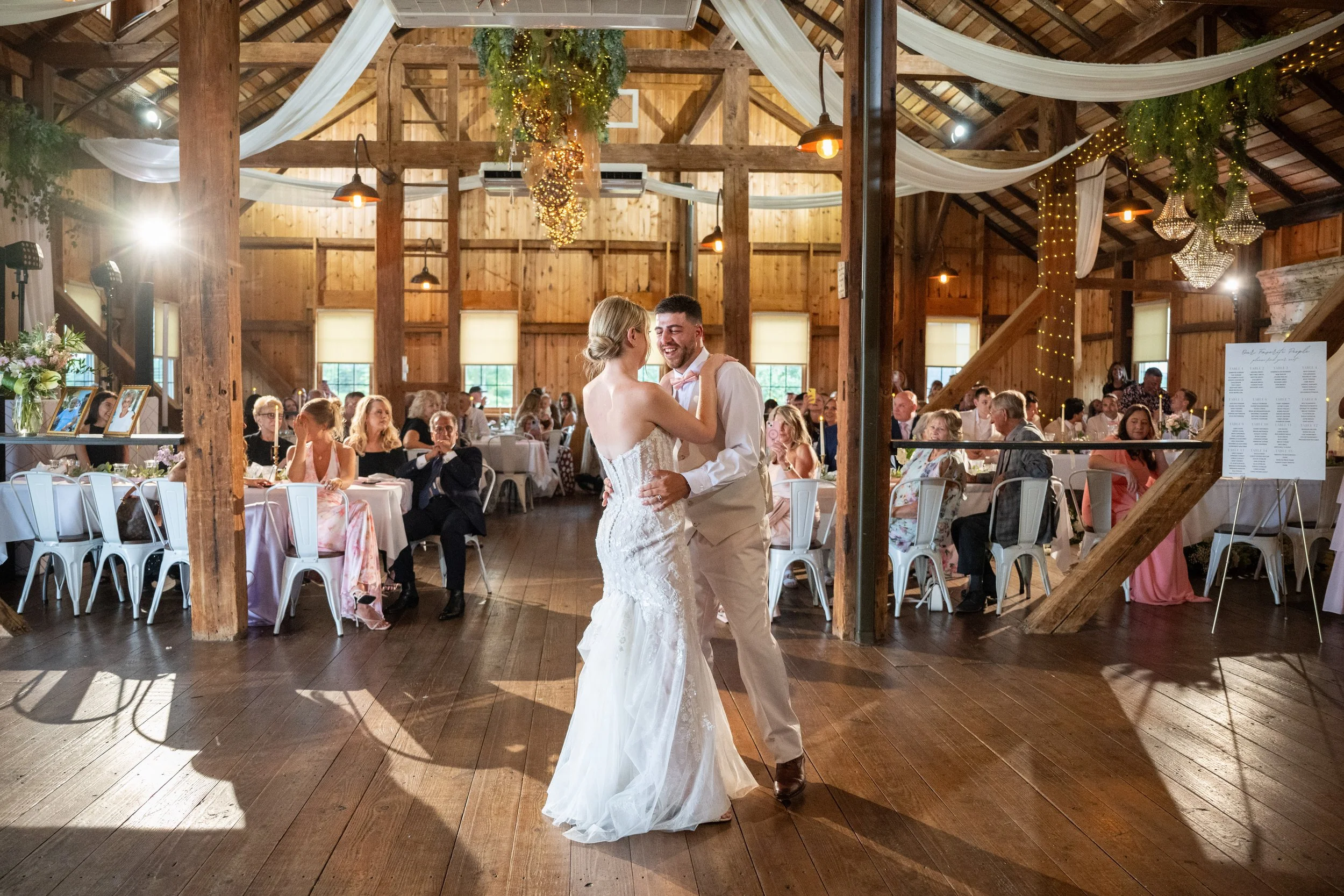 Our rustic barn is a beautiful backdrop for your first dance.