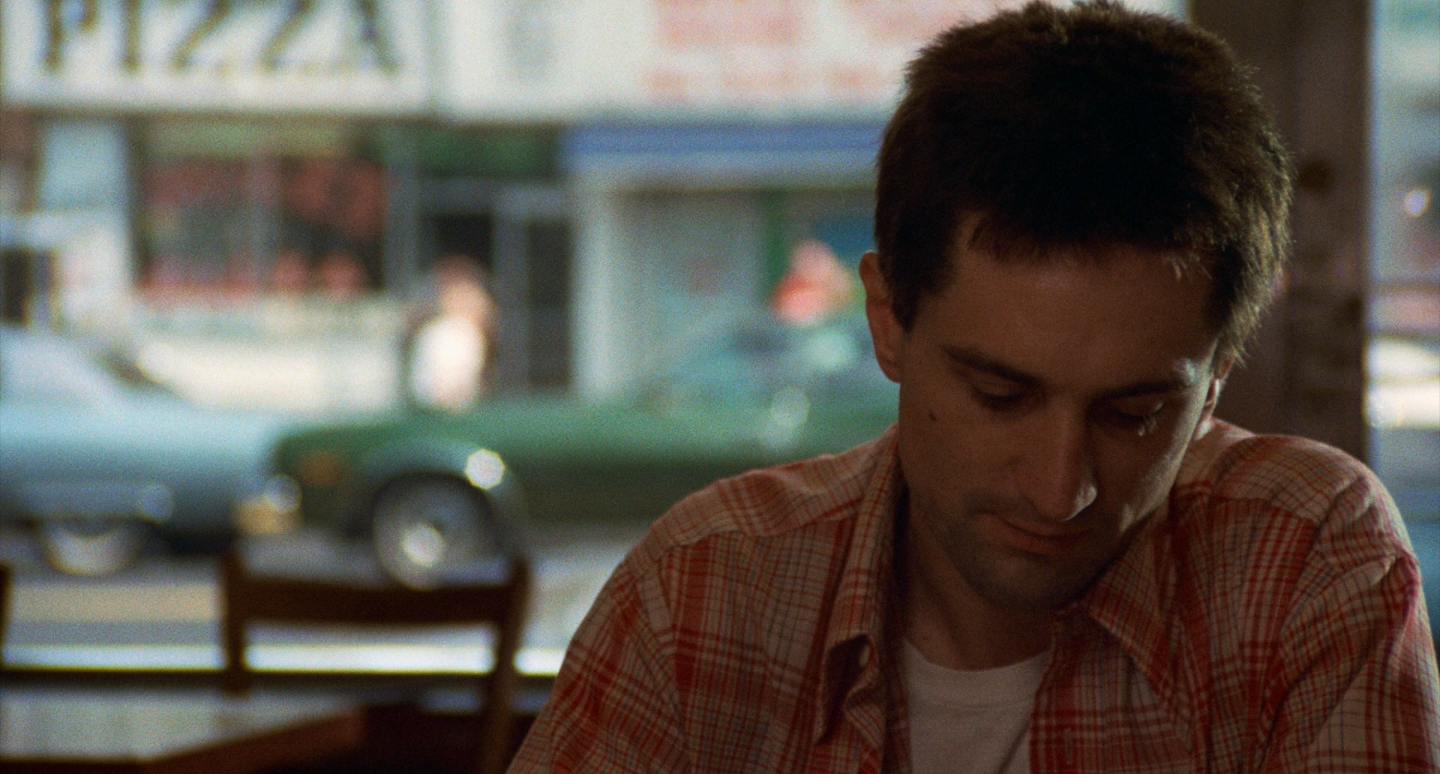 Travis in diner.png