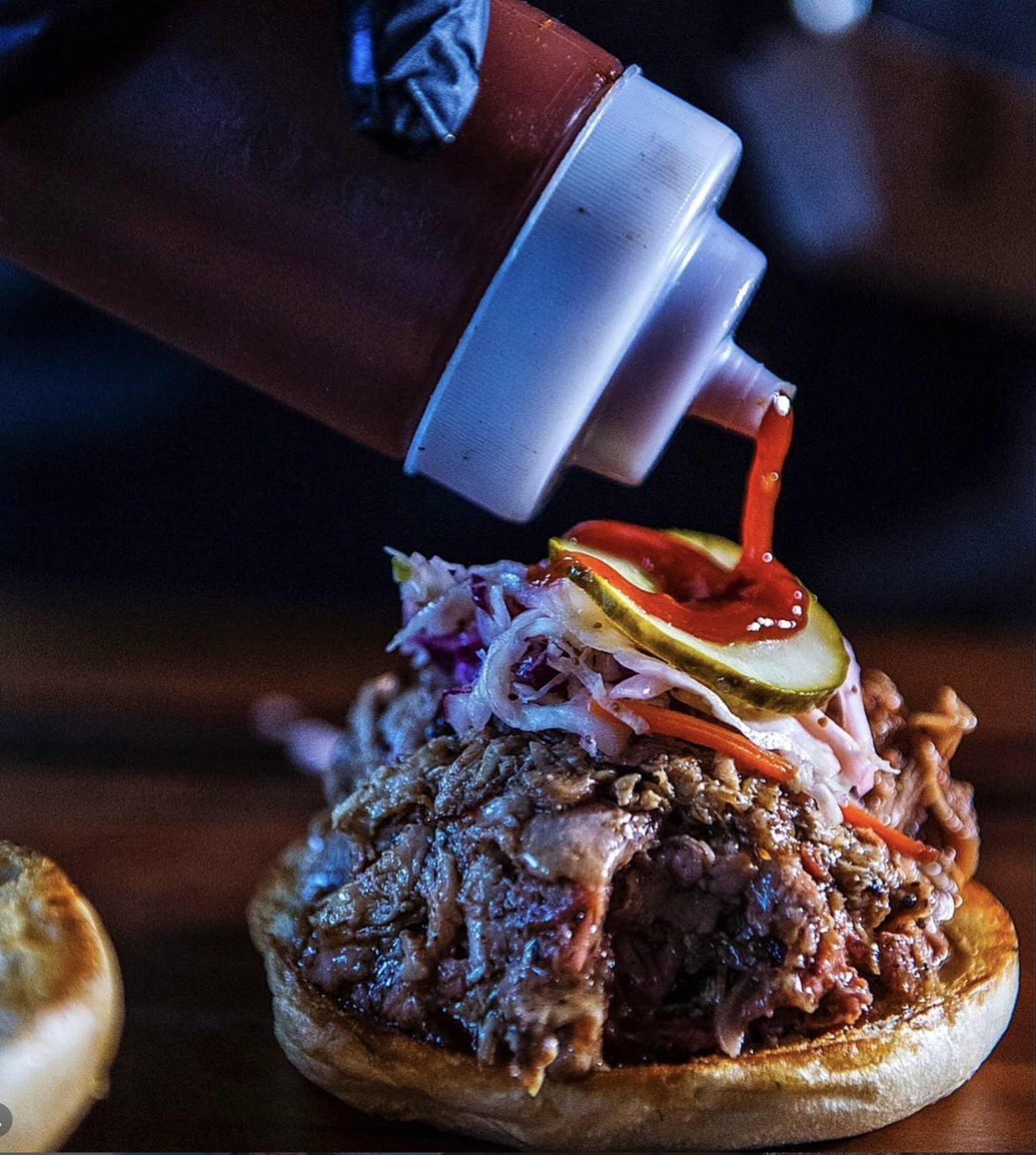 Cherry ST BBQ sauce pour on brisket sandwich